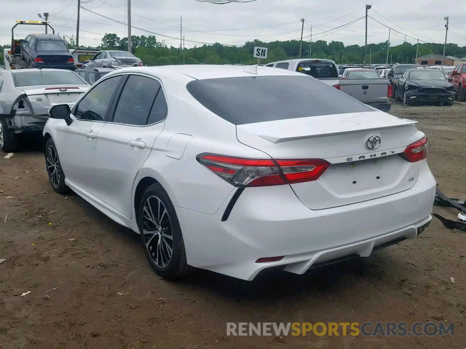 3 Photograph of a damaged car 4T1B11HK8KU743885 TOYOTA CAMRY 2019