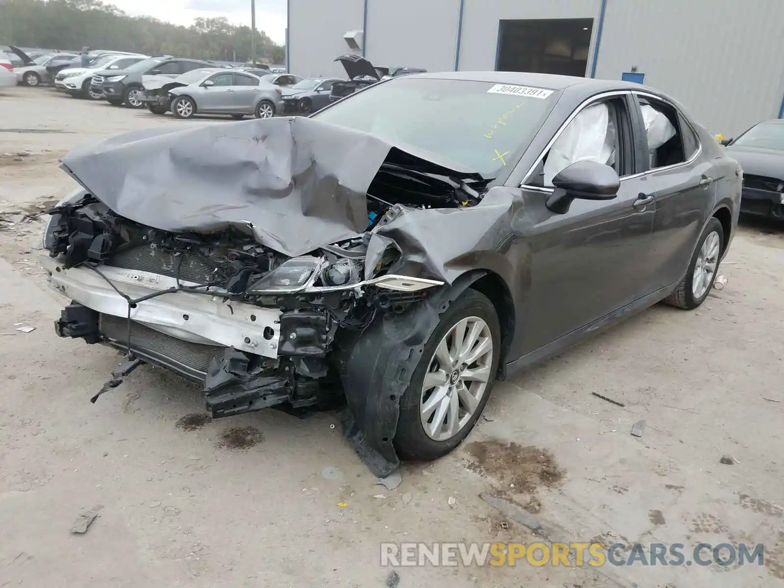 2 Photograph of a damaged car 4T1B11HK8KU751050 TOYOTA CAMRY 2019