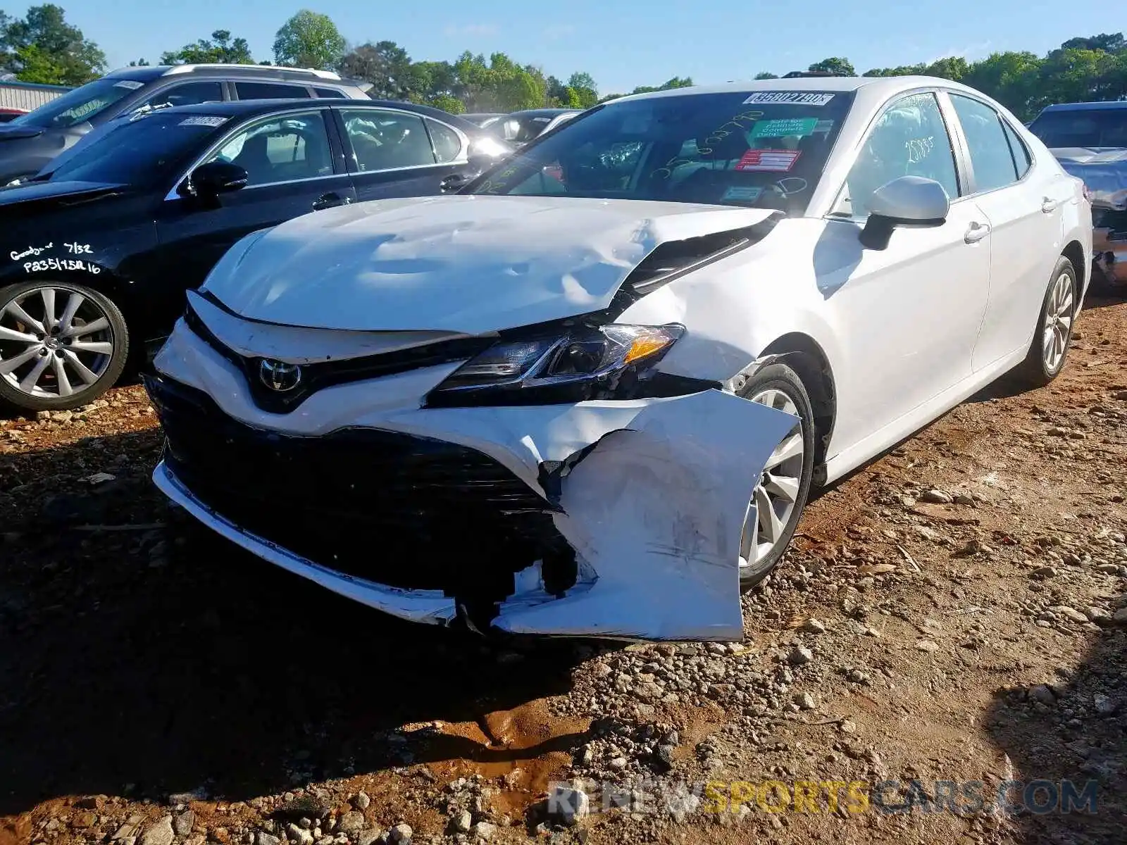 2 Photograph of a damaged car 4T1B11HK8KU755700 TOYOTA CAMRY 2019