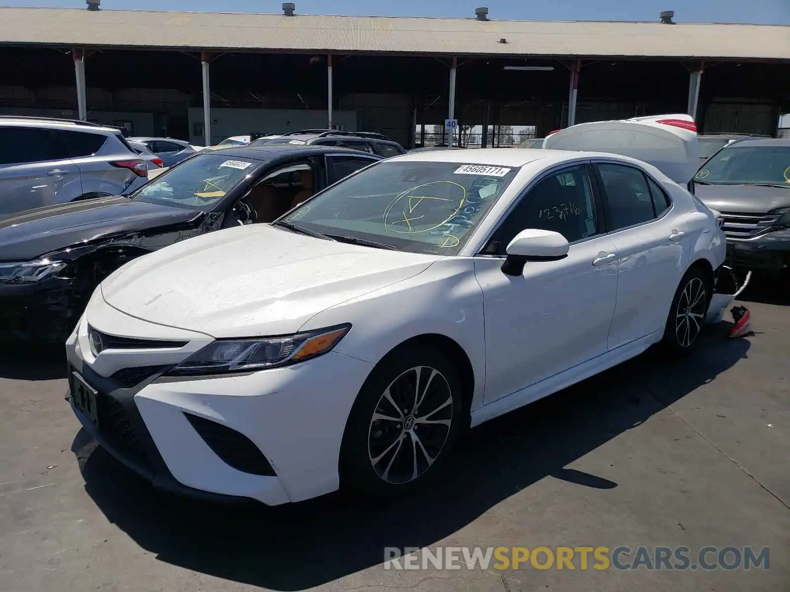 2 Photograph of a damaged car 4T1B11HK8KU758175 TOYOTA CAMRY 2019