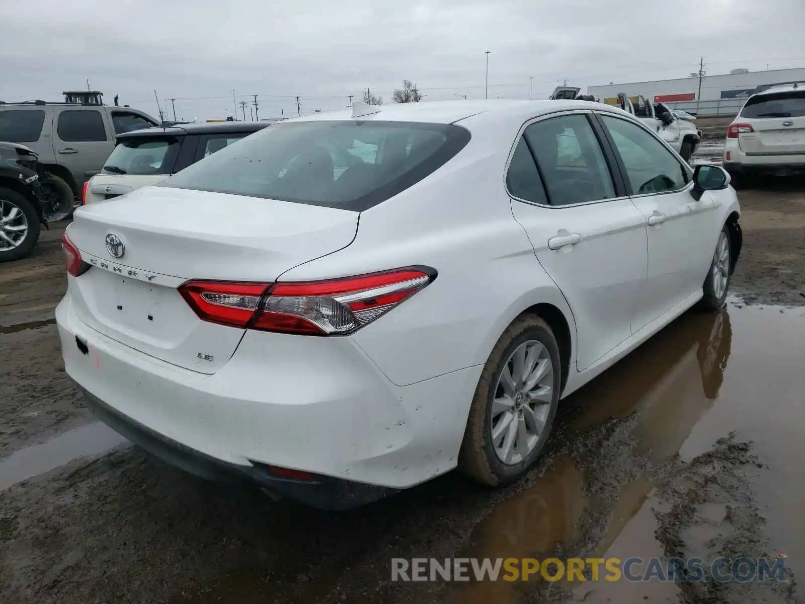 4 Photograph of a damaged car 4T1B11HK8KU768057 TOYOTA CAMRY 2019