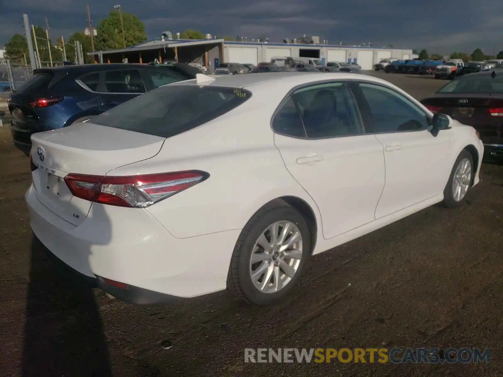 4 Photograph of a damaged car 4T1B11HK8KU769614 TOYOTA CAMRY 2019