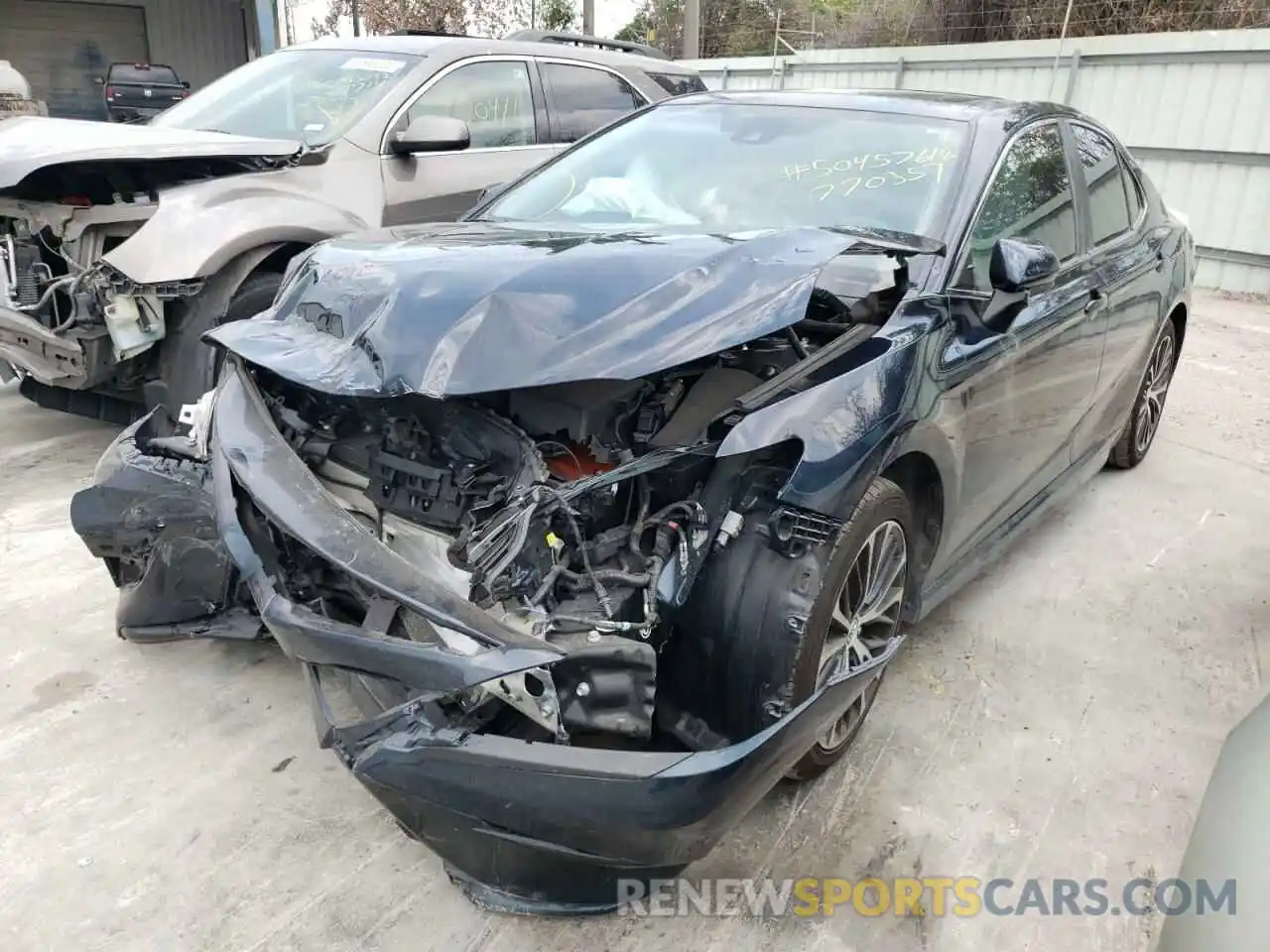 2 Photograph of a damaged car 4T1B11HK8KU770357 TOYOTA CAMRY 2019