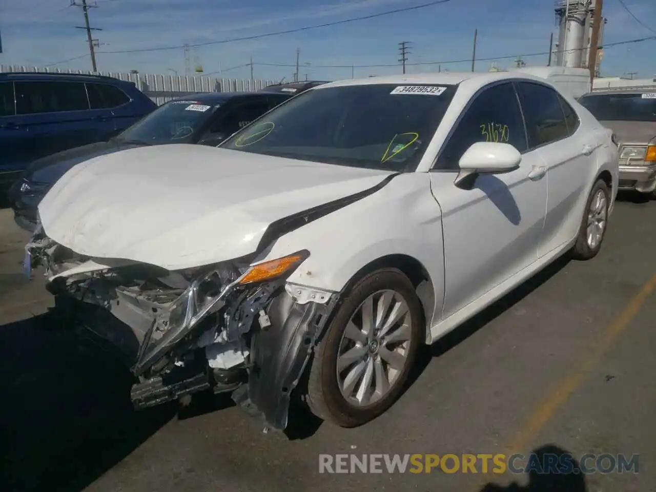 2 Photograph of a damaged car 4T1B11HK8KU774540 TOYOTA CAMRY 2019