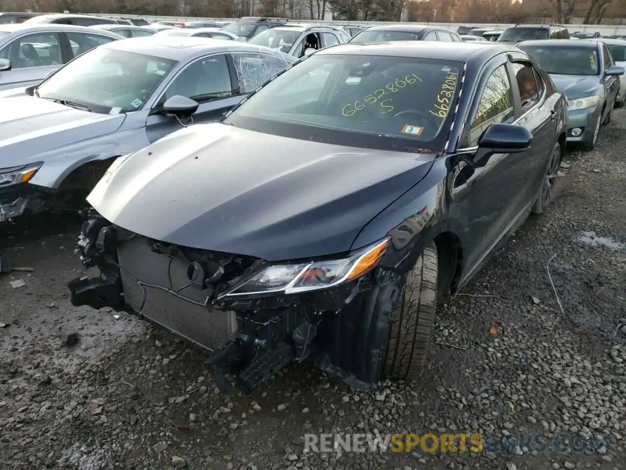 2 Photograph of a damaged car 4T1B11HK8KU785585 TOYOTA CAMRY 2019