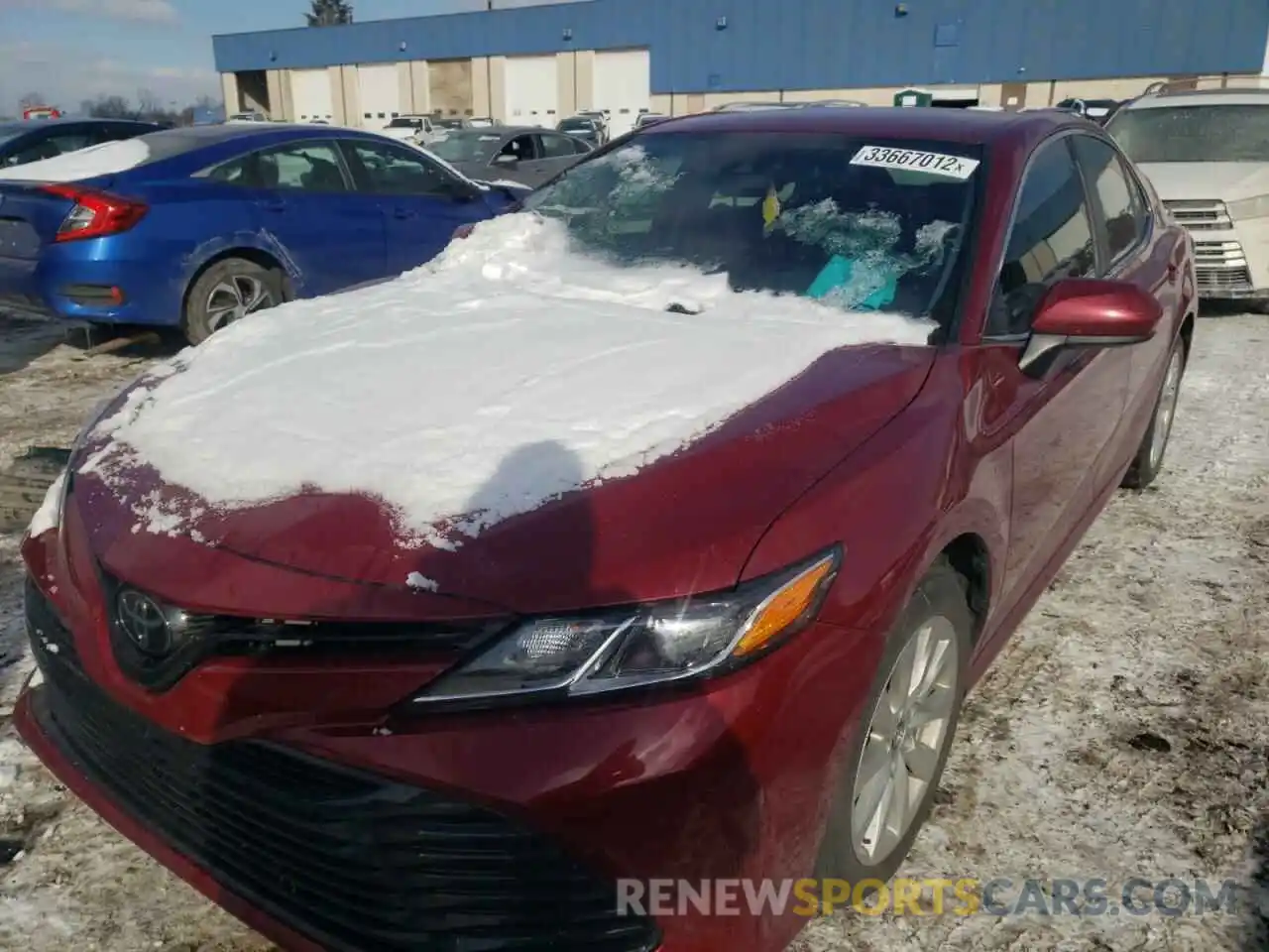 2 Photograph of a damaged car 4T1B11HK8KU787739 TOYOTA CAMRY 2019