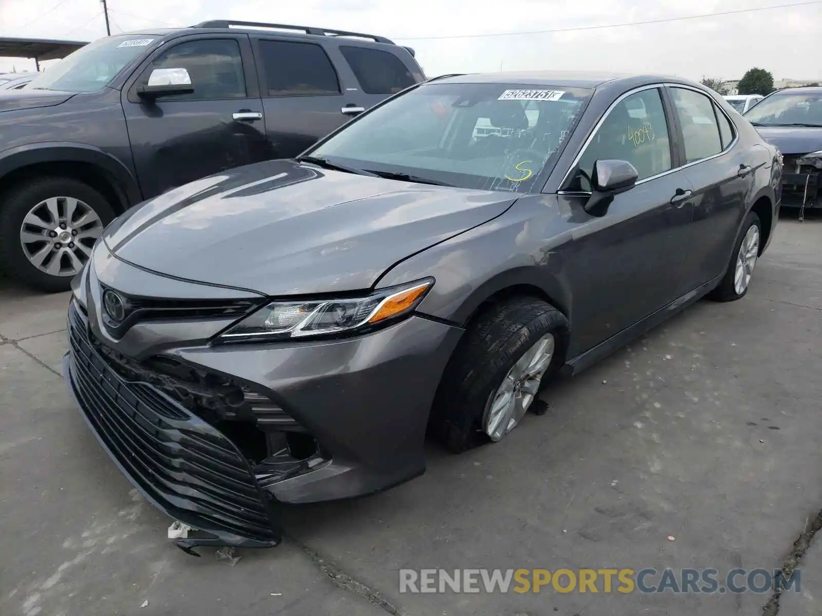 2 Photograph of a damaged car 4T1B11HK8KU799731 TOYOTA CAMRY 2019