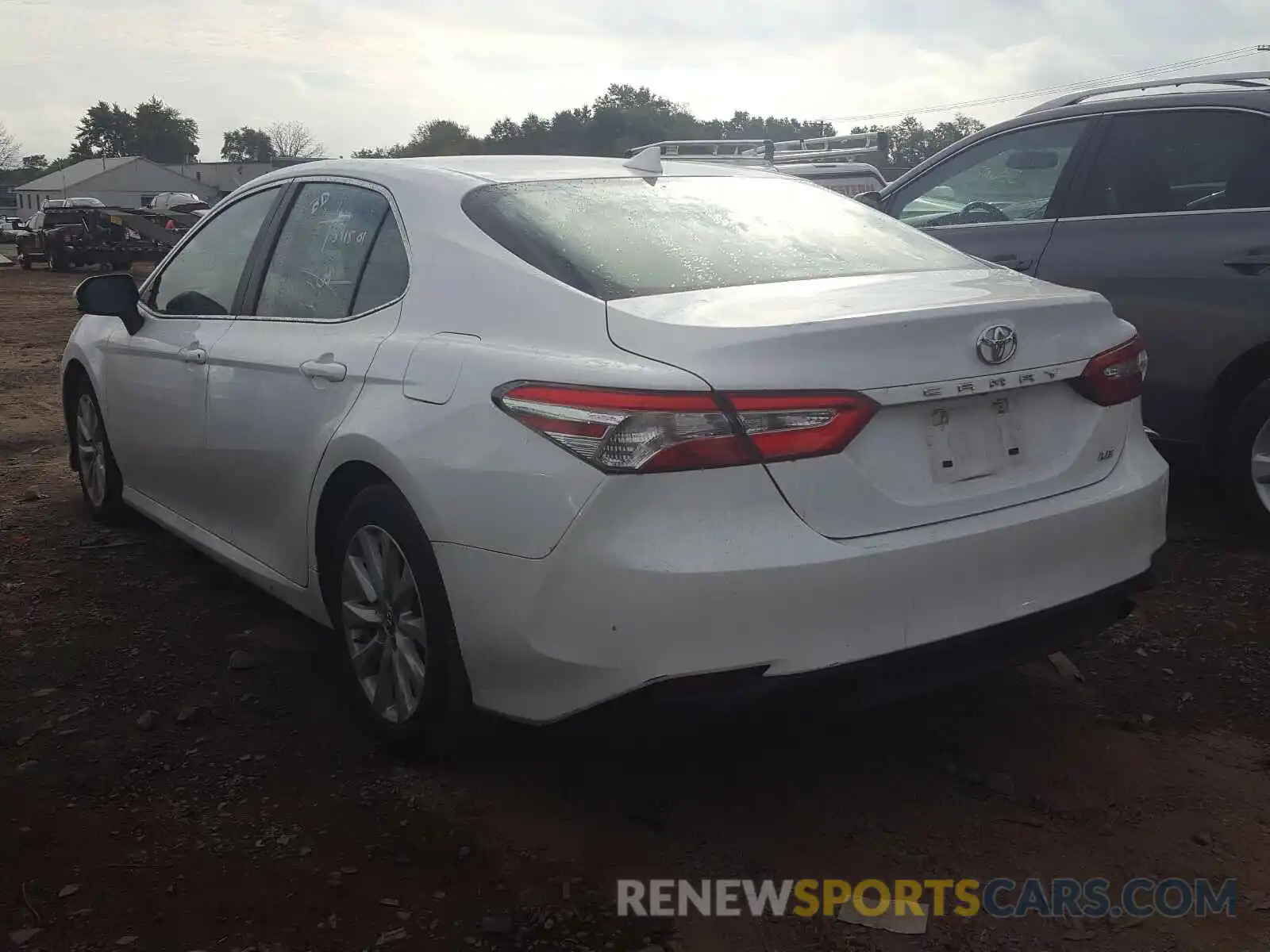 3 Photograph of a damaged car 4T1B11HK8KU801865 TOYOTA CAMRY 2019