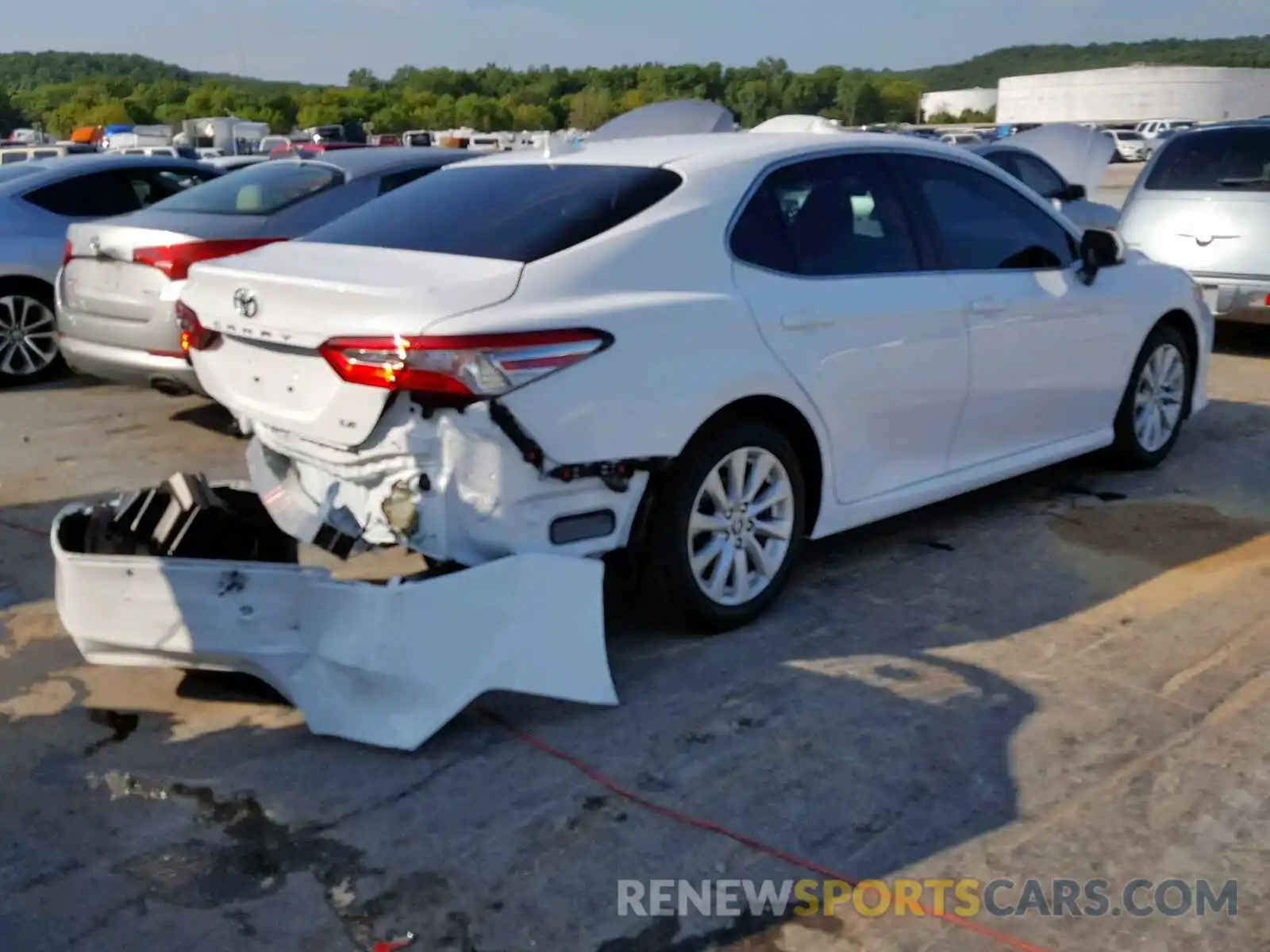 4 Photograph of a damaged car 4T1B11HK8KU809206 TOYOTA CAMRY 2019