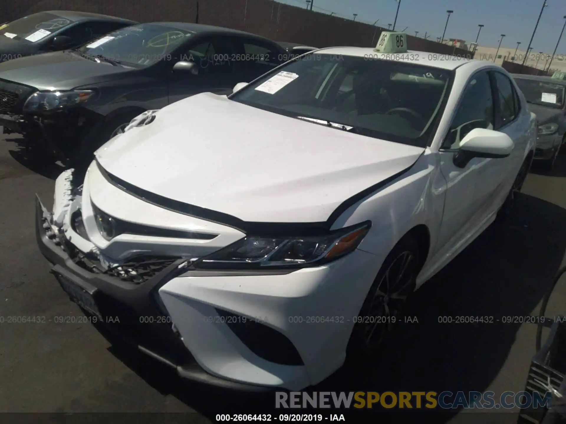 2 Photograph of a damaged car 4T1B11HK8KU809805 TOYOTA CAMRY 2019