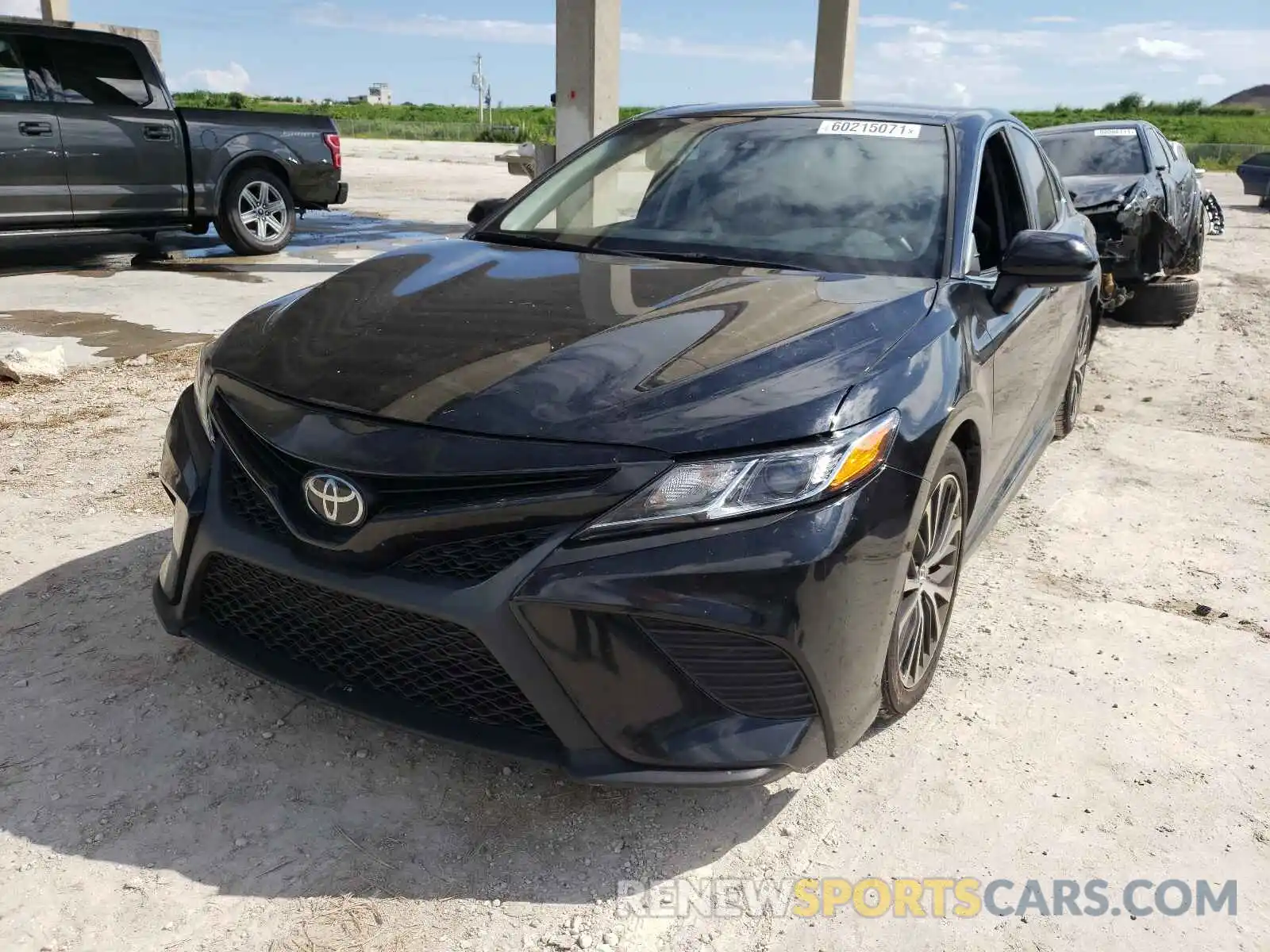 2 Photograph of a damaged car 4T1B11HK8KU811201 TOYOTA CAMRY 2019