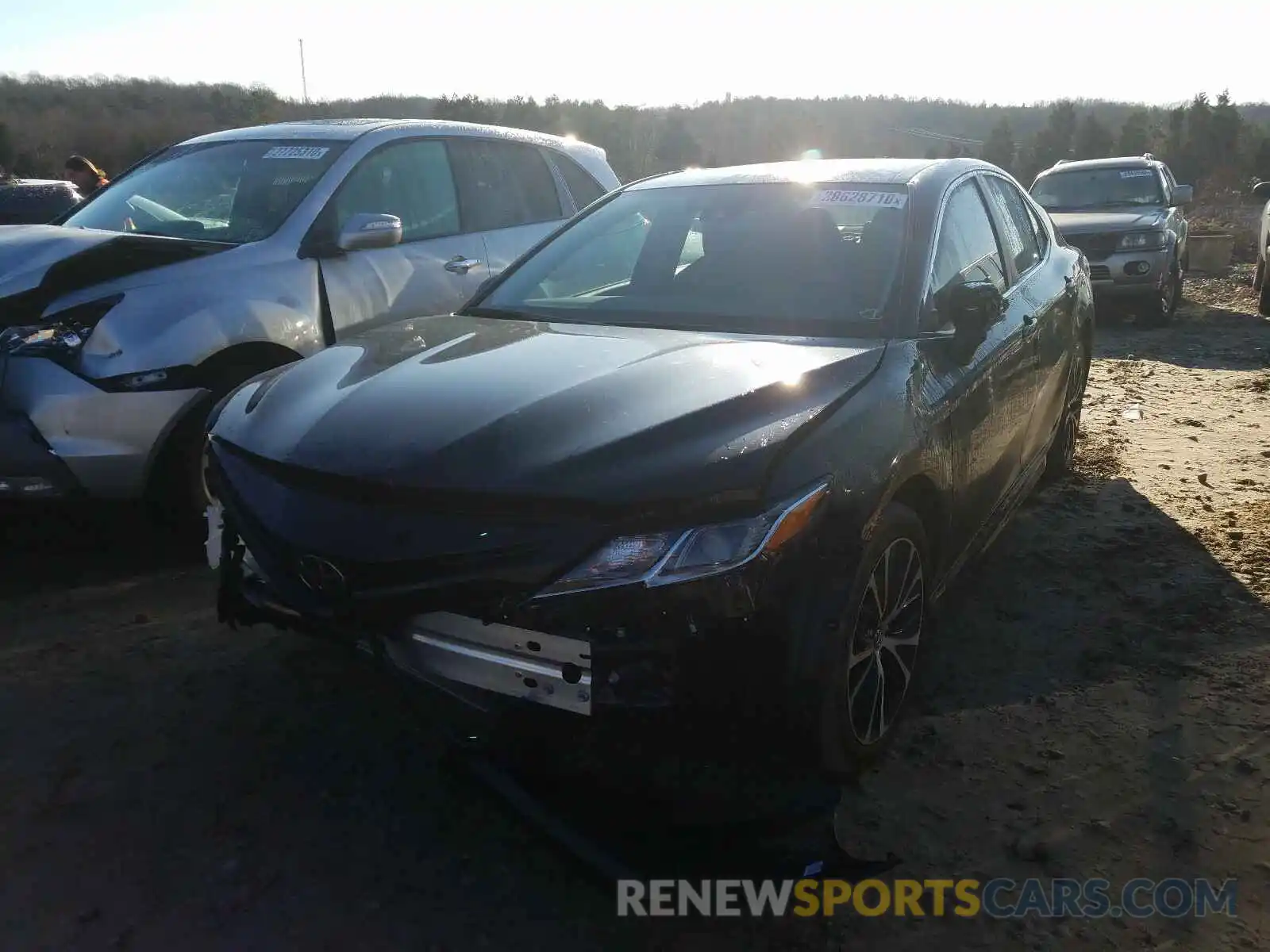 2 Photograph of a damaged car 4T1B11HK8KU812123 TOYOTA CAMRY 2019