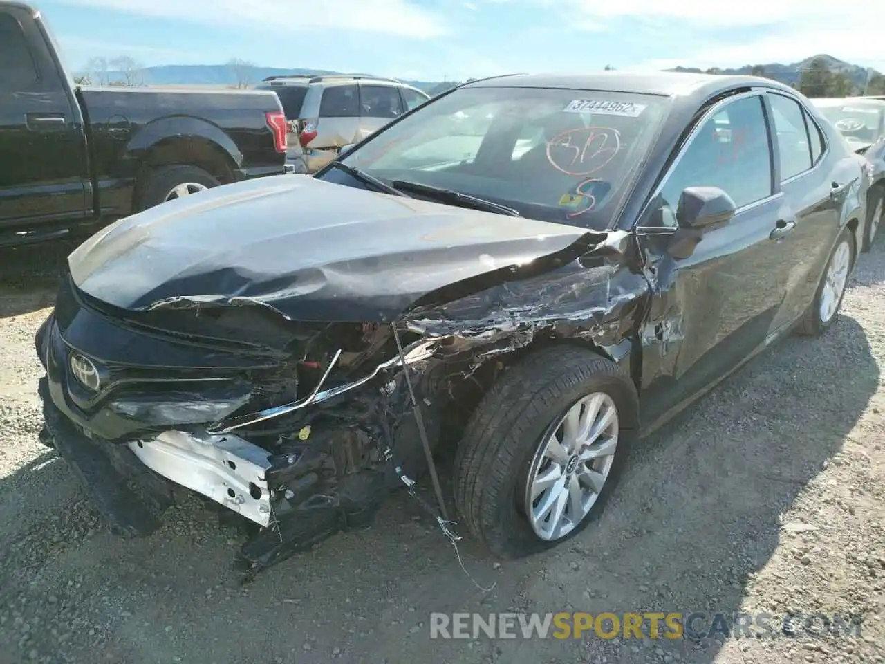 2 Photograph of a damaged car 4T1B11HK8KU814082 TOYOTA CAMRY 2019