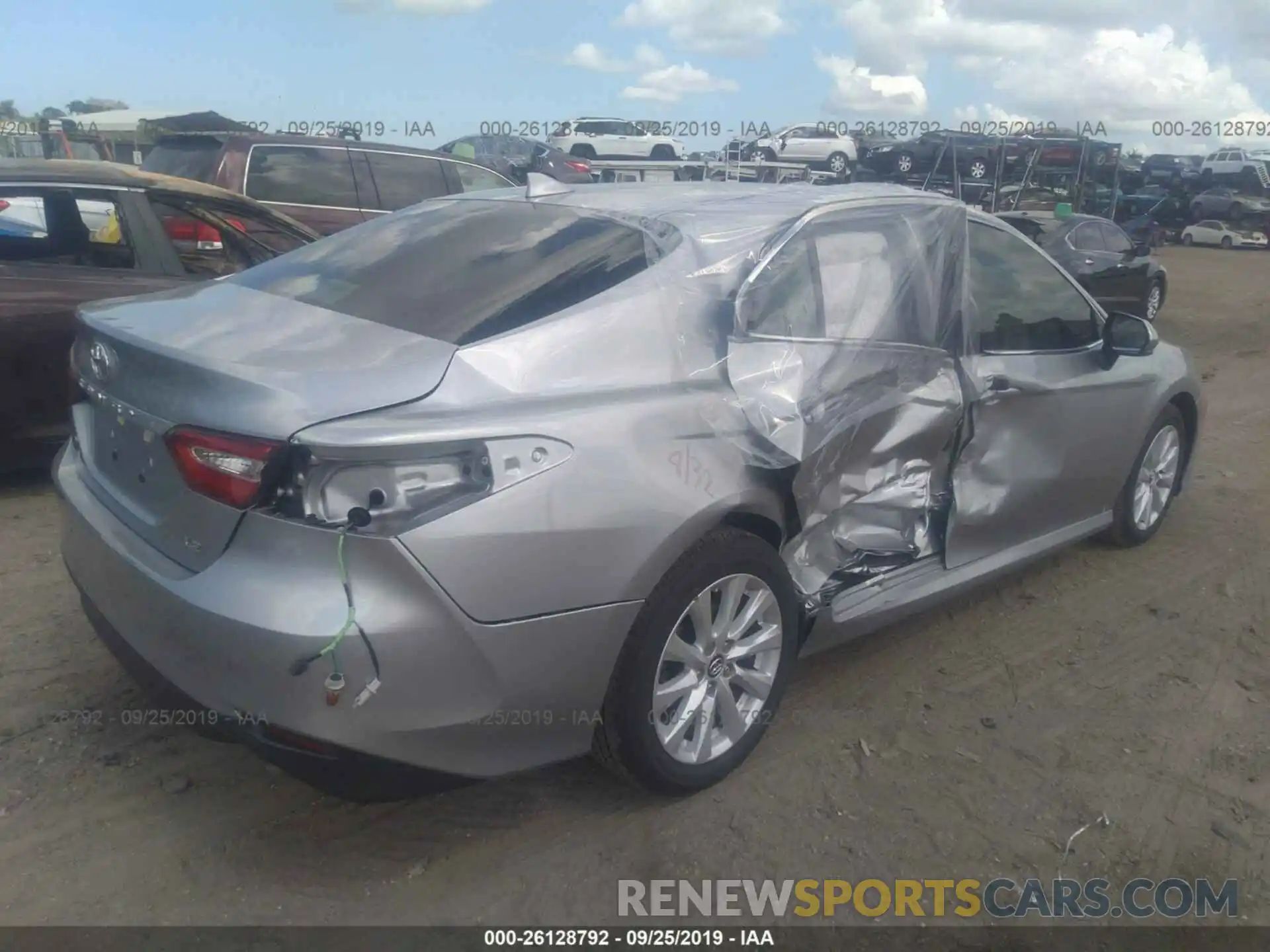 4 Photograph of a damaged car 4T1B11HK8KU815765 TOYOTA CAMRY 2019