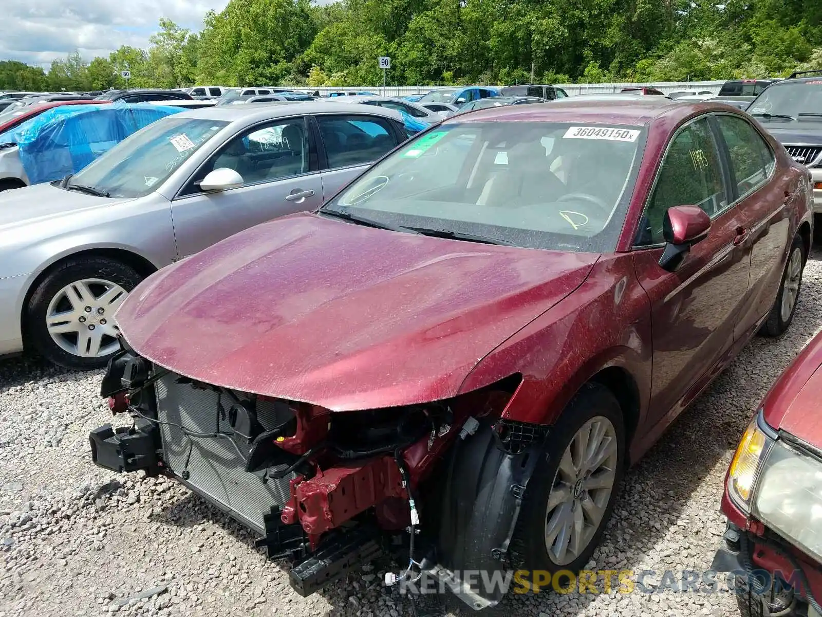 2 Photograph of a damaged car 4T1B11HK8KU817547 TOYOTA CAMRY 2019