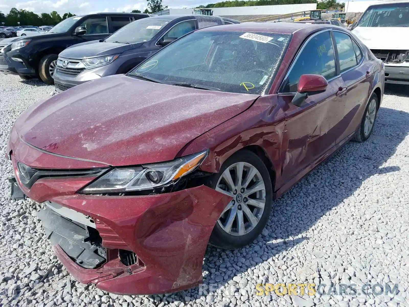 2 Photograph of a damaged car 4T1B11HK8KU819279 TOYOTA CAMRY 2019