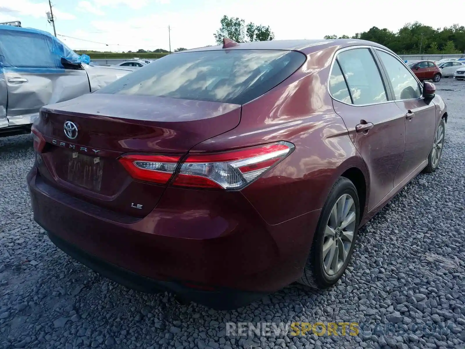 4 Photograph of a damaged car 4T1B11HK8KU819279 TOYOTA CAMRY 2019