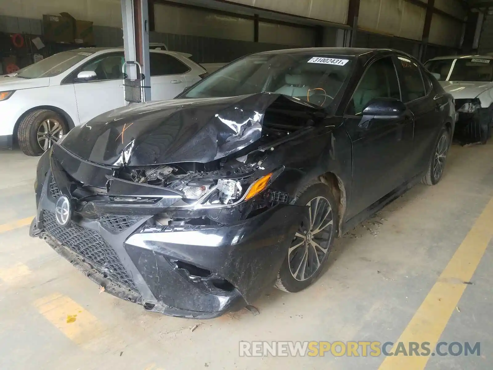 2 Photograph of a damaged car 4T1B11HK8KU819668 TOYOTA CAMRY 2019