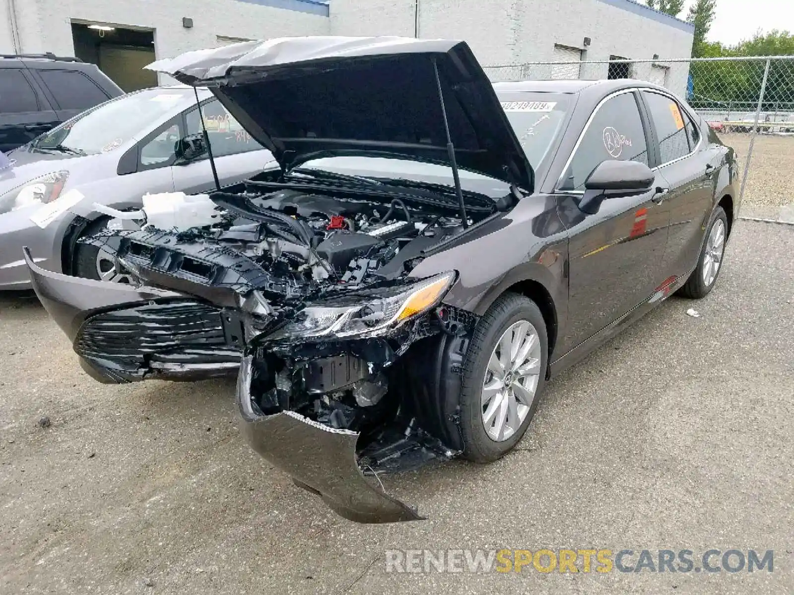 2 Photograph of a damaged car 4T1B11HK8KU820139 TOYOTA CAMRY 2019