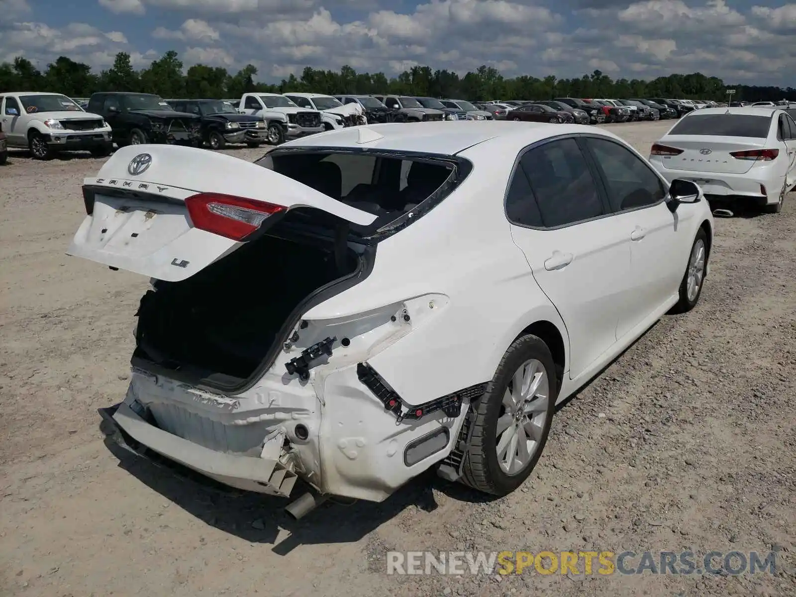 4 Photograph of a damaged car 4T1B11HK8KU820710 TOYOTA CAMRY 2019