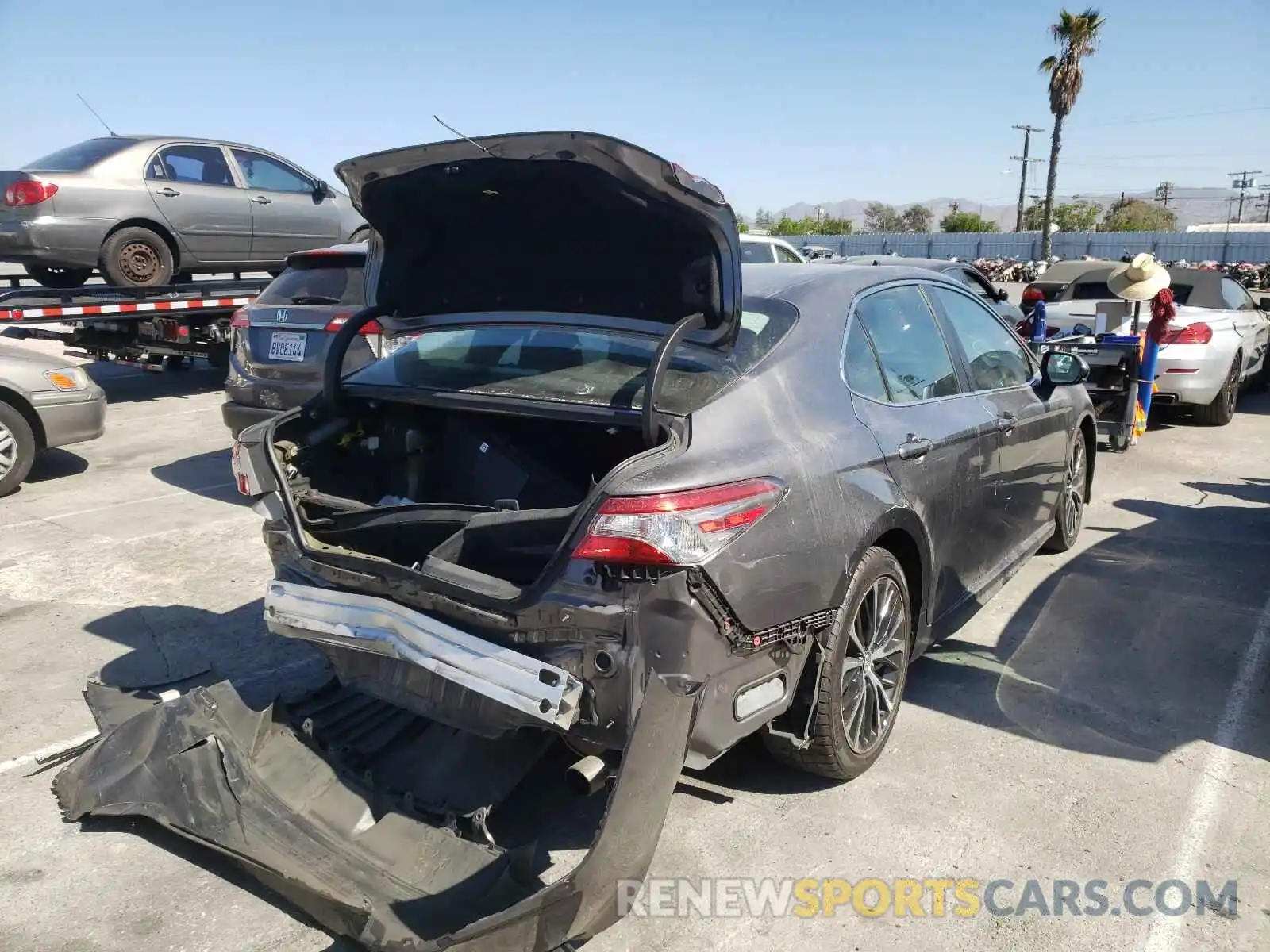 4 Photograph of a damaged car 4T1B11HK8KU823820 TOYOTA CAMRY 2019