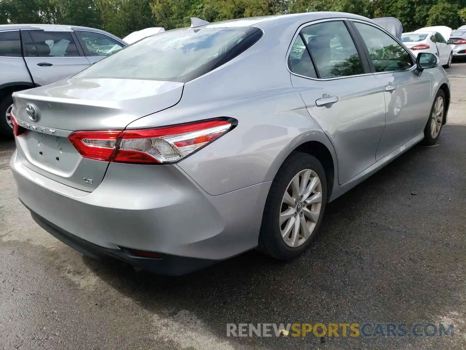 4 Photograph of a damaged car 4T1B11HK8KU825504 TOYOTA CAMRY 2019