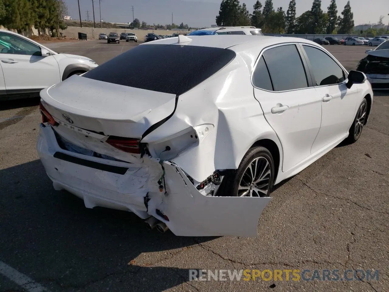 4 Photograph of a damaged car 4T1B11HK8KU829293 TOYOTA CAMRY 2019