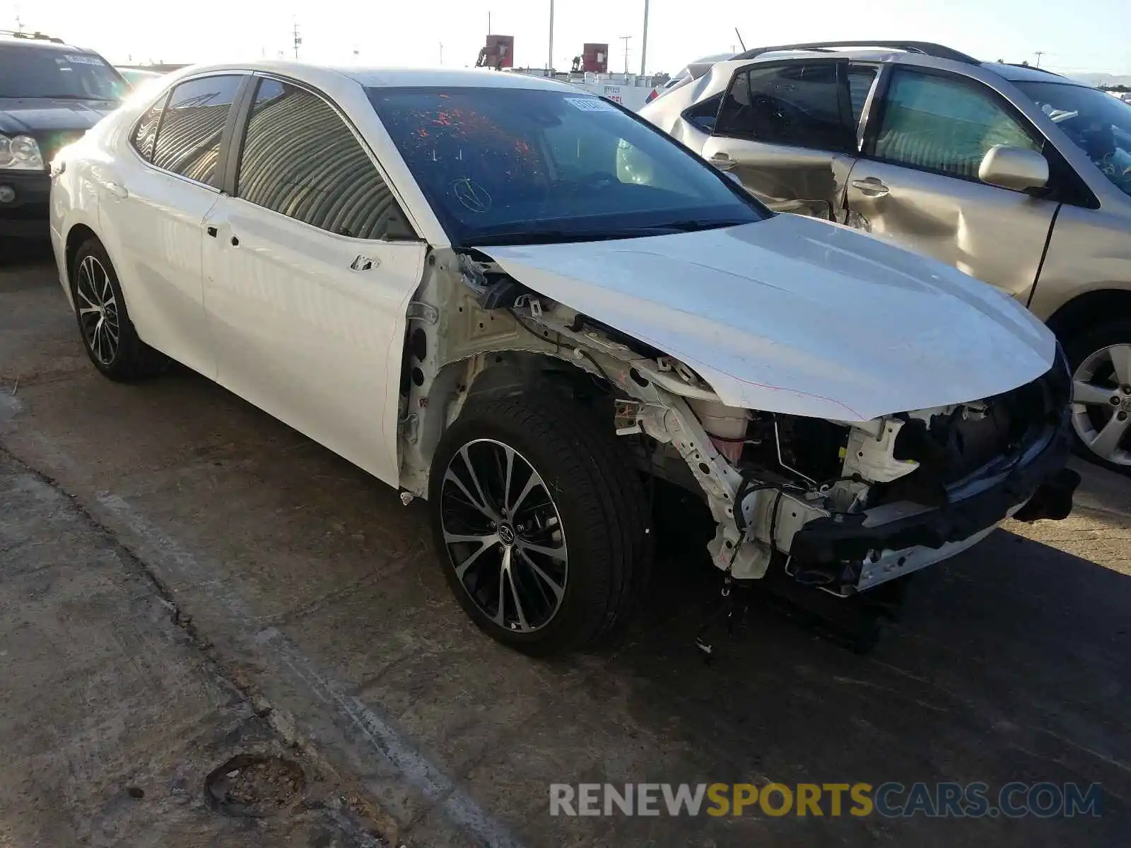 1 Photograph of a damaged car 4T1B11HK8KU851424 TOYOTA CAMRY 2019