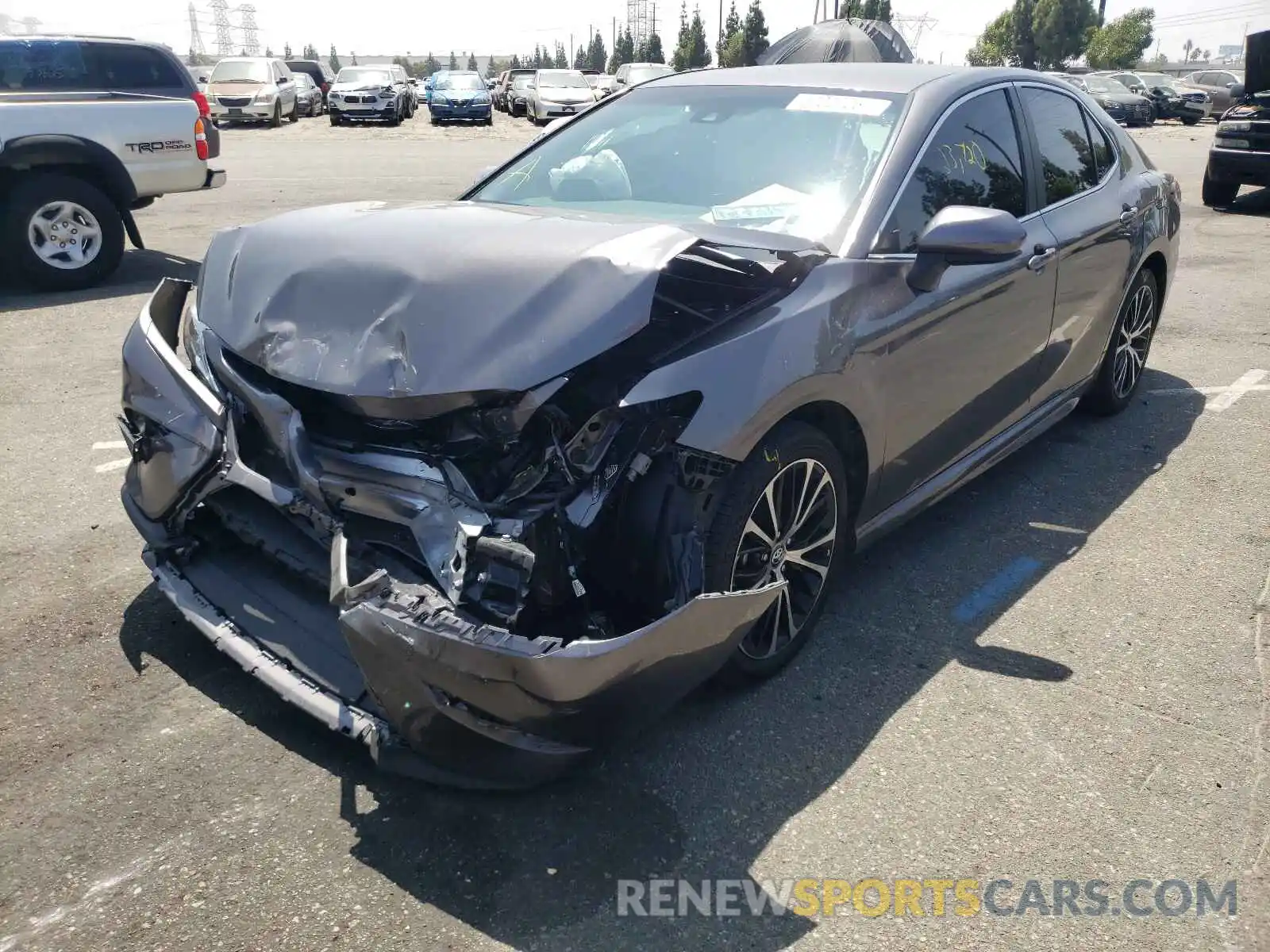 2 Photograph of a damaged car 4T1B11HK8KU854078 TOYOTA CAMRY 2019