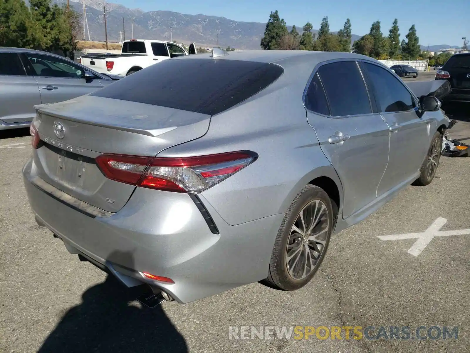 4 Photograph of a damaged car 4T1B11HK8KU856591 TOYOTA CAMRY 2019