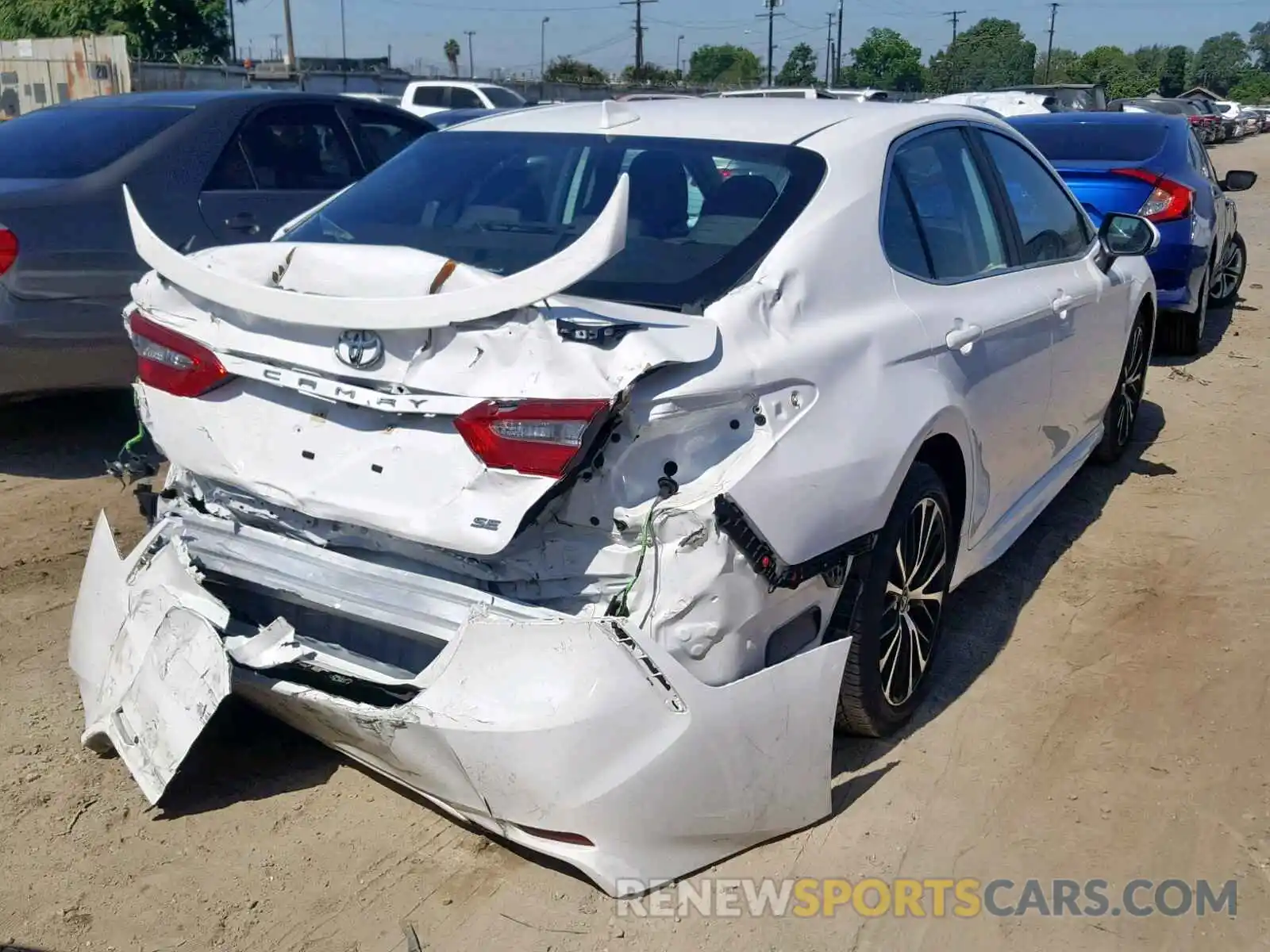 4 Photograph of a damaged car 4T1B11HK9KU166753 TOYOTA CAMRY 2019