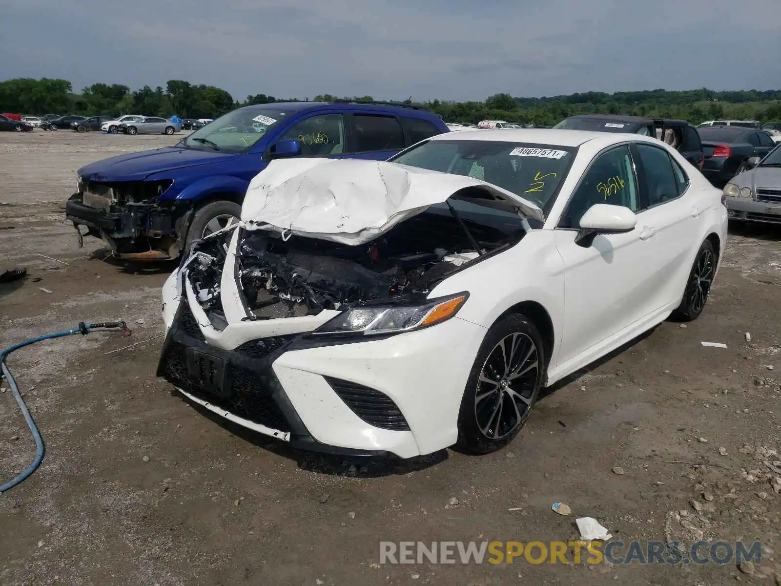 2 Photograph of a damaged car 4T1B11HK9KU168566 TOYOTA CAMRY 2019