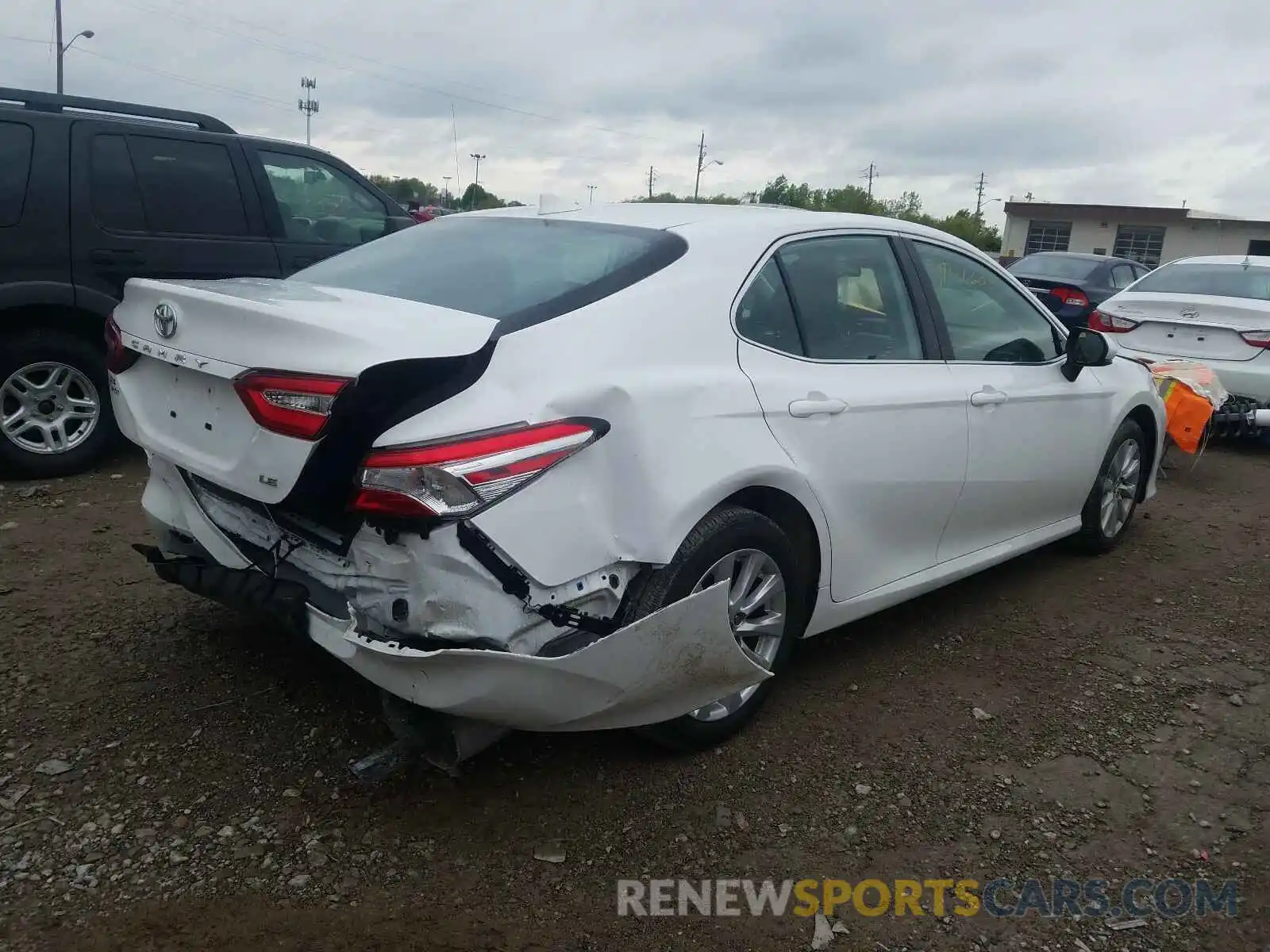 4 Photograph of a damaged car 4T1B11HK9KU171550 TOYOTA CAMRY 2019