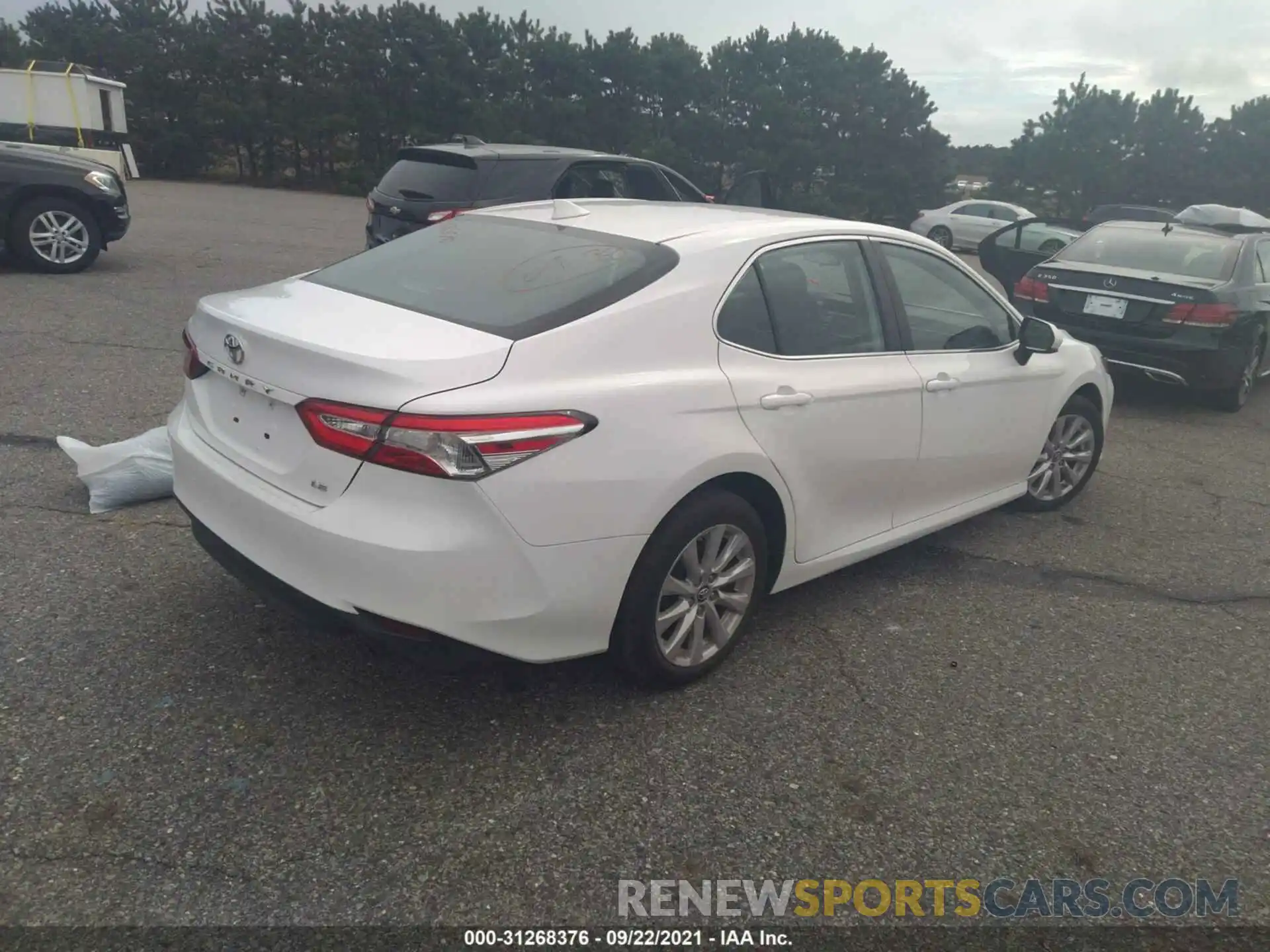 4 Photograph of a damaged car 4T1B11HK9KU173041 TOYOTA CAMRY 2019