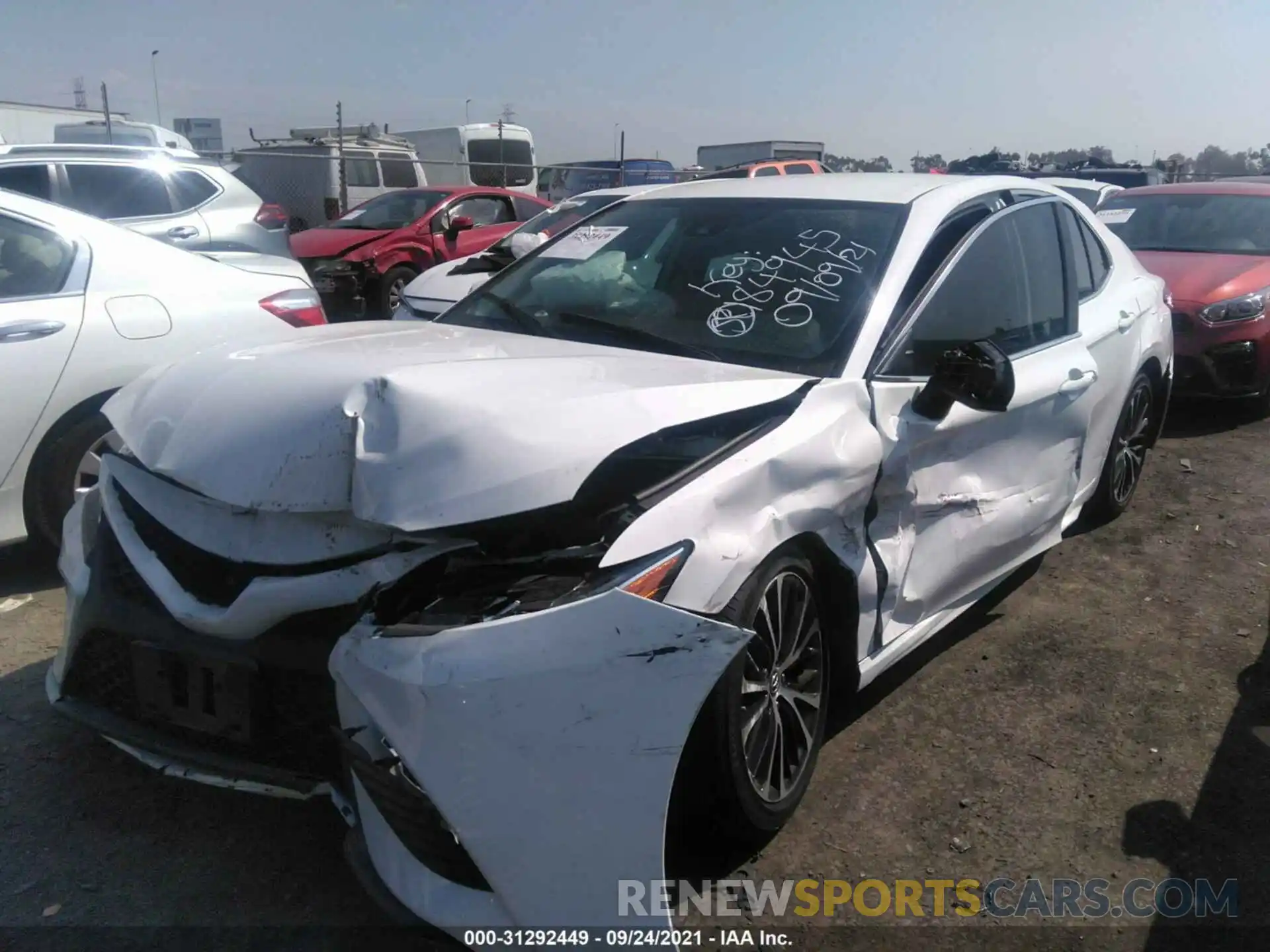 2 Photograph of a damaged car 4T1B11HK9KU184945 TOYOTA CAMRY 2019