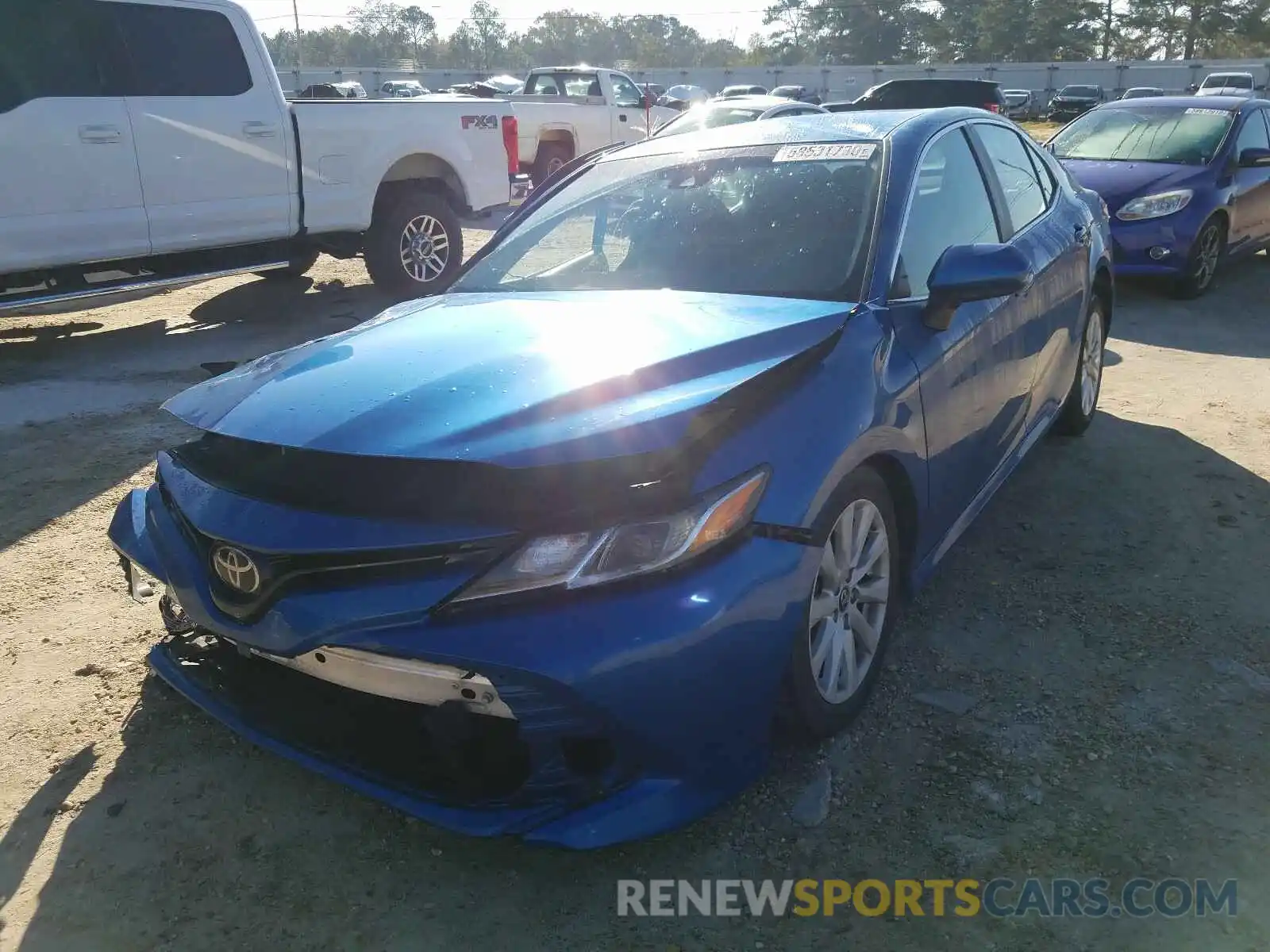 2 Photograph of a damaged car 4T1B11HK9KU194374 TOYOTA CAMRY 2019