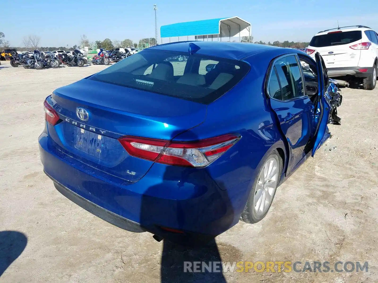 4 Photograph of a damaged car 4T1B11HK9KU194374 TOYOTA CAMRY 2019