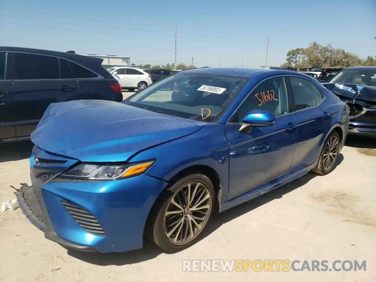 2 Photograph of a damaged car 4T1B11HK9KU198635 TOYOTA CAMRY 2019