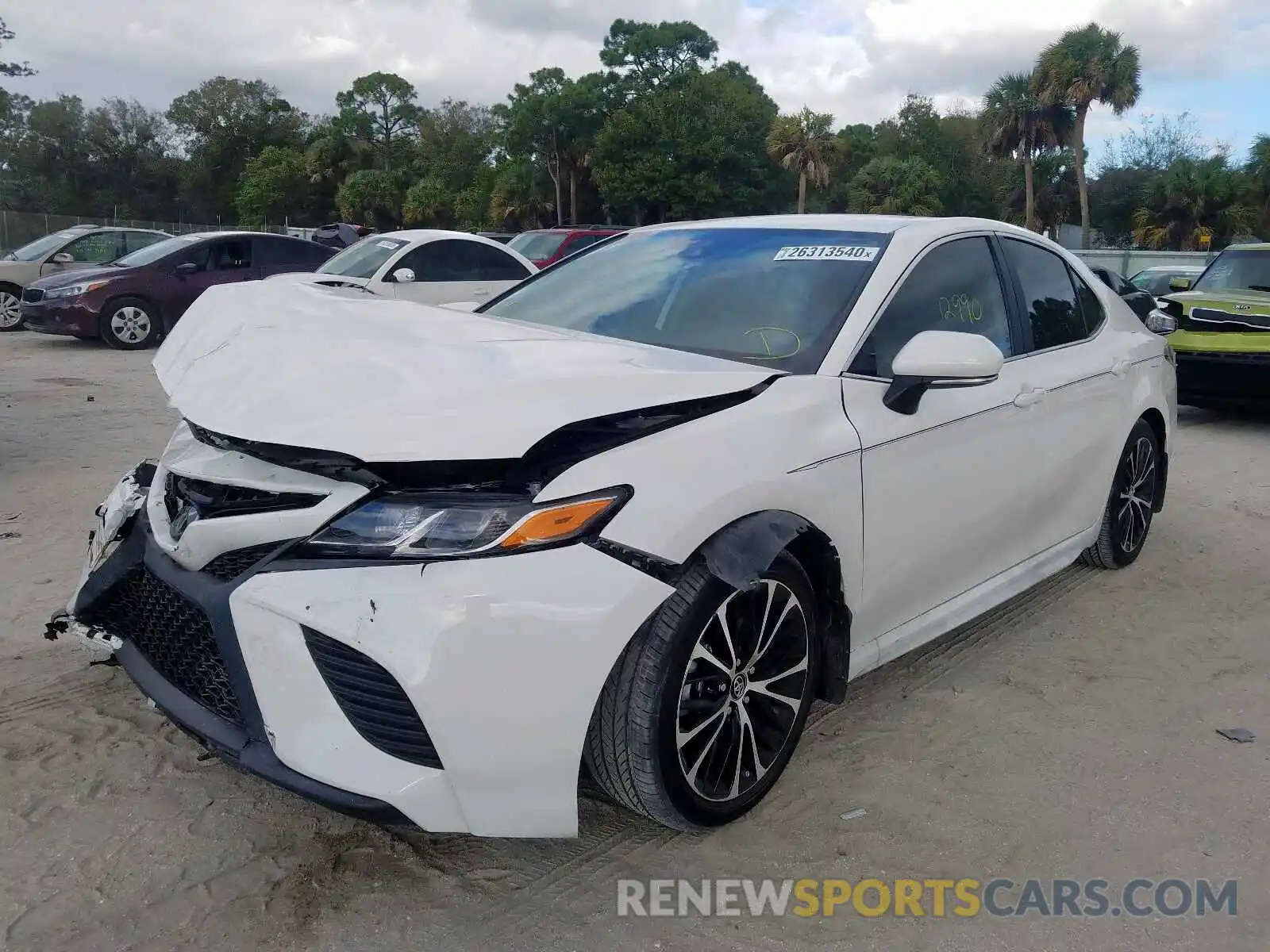 2 Photograph of a damaged car 4T1B11HK9KU201100 TOYOTA CAMRY 2019