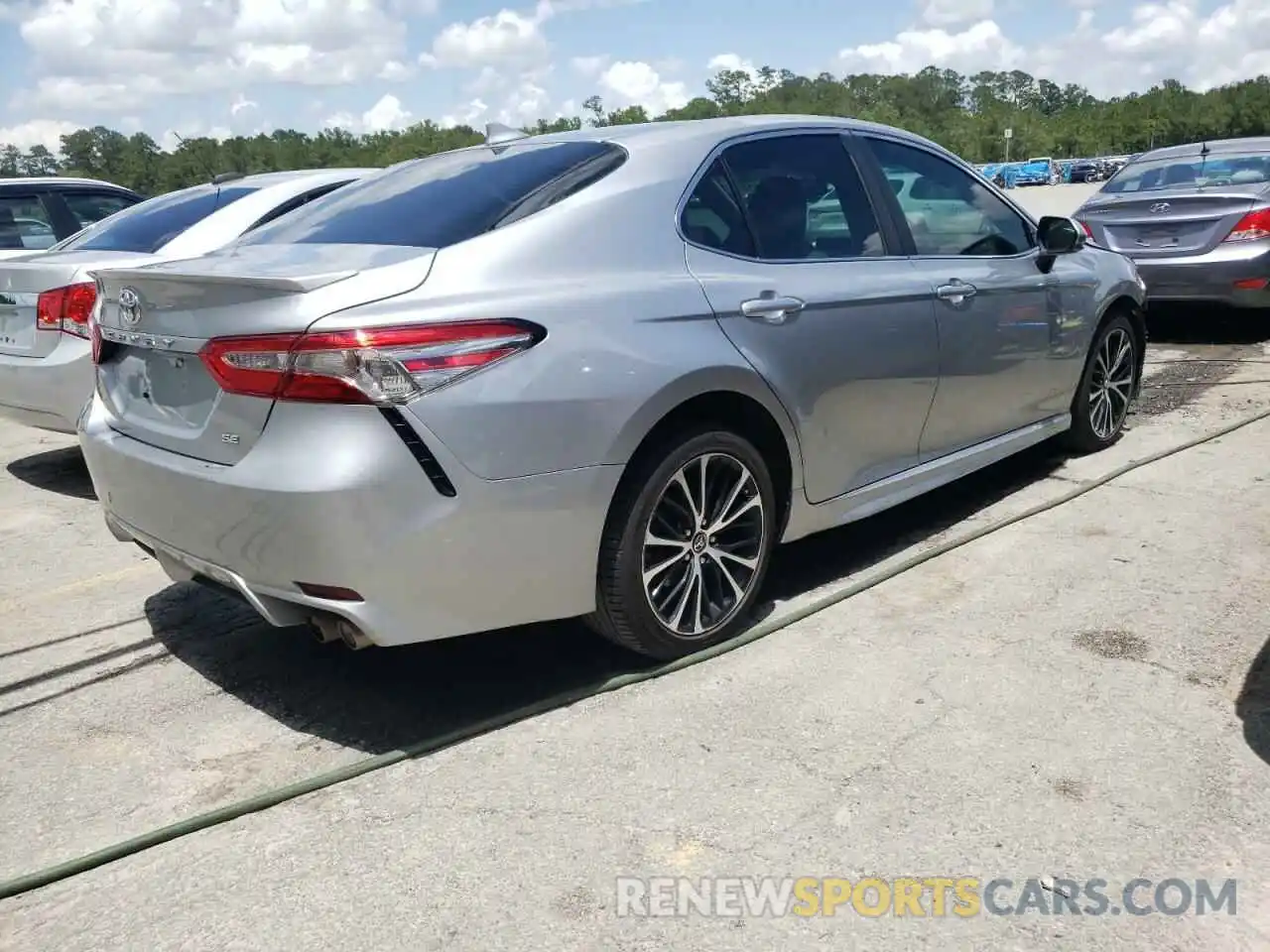 4 Photograph of a damaged car 4T1B11HK9KU204451 TOYOTA CAMRY 2019