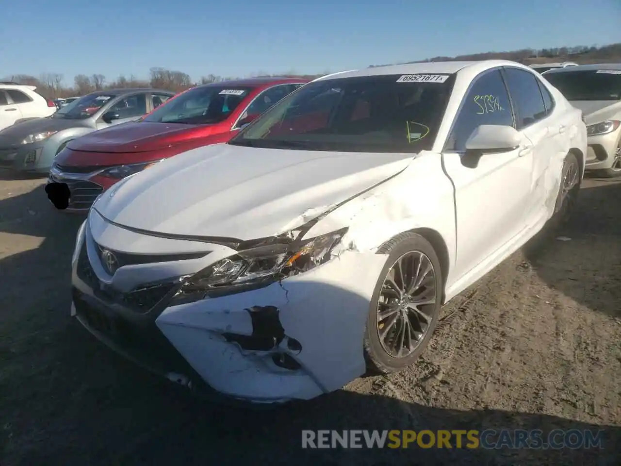 2 Photograph of a damaged car 4T1B11HK9KU204739 TOYOTA CAMRY 2019