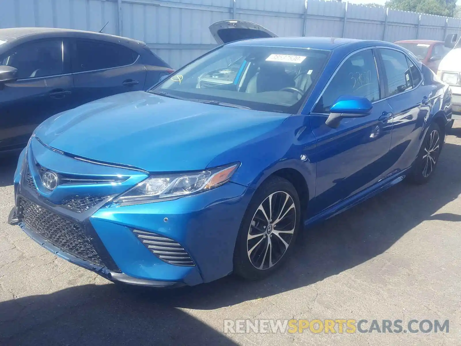 2 Photograph of a damaged car 4T1B11HK9KU209178 TOYOTA CAMRY 2019