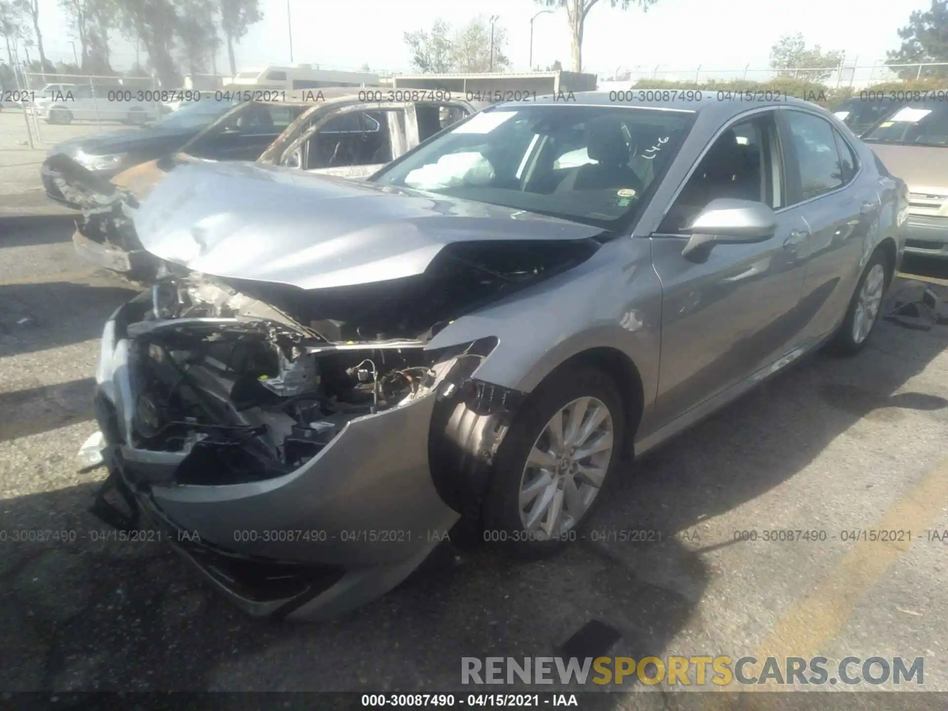 2 Photograph of a damaged car 4T1B11HK9KU209875 TOYOTA CAMRY 2019