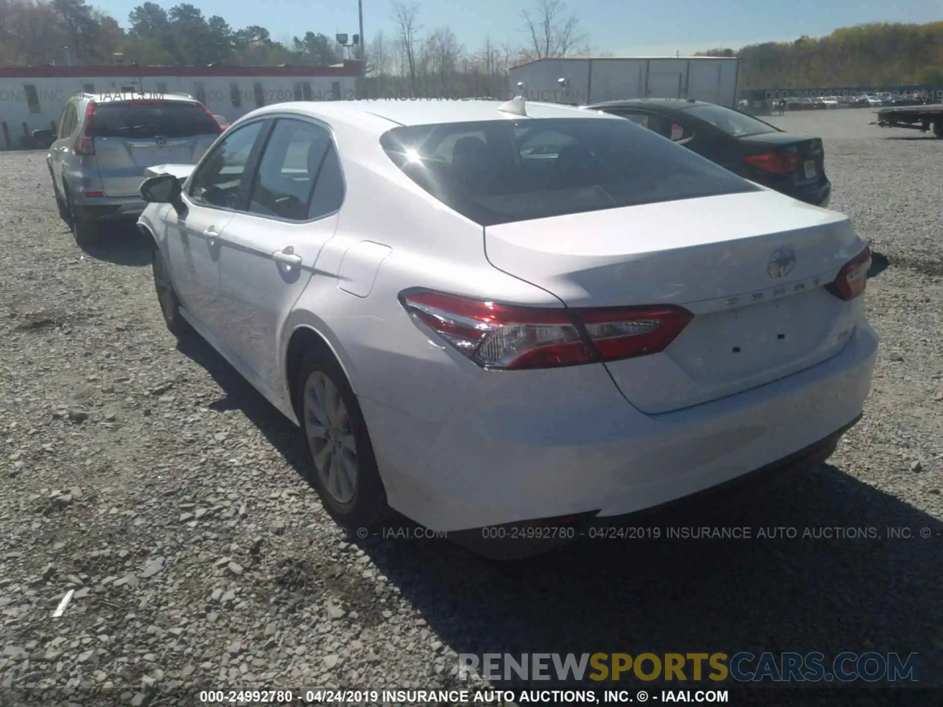 3 Photograph of a damaged car 4T1B11HK9KU211867 TOYOTA CAMRY 2019