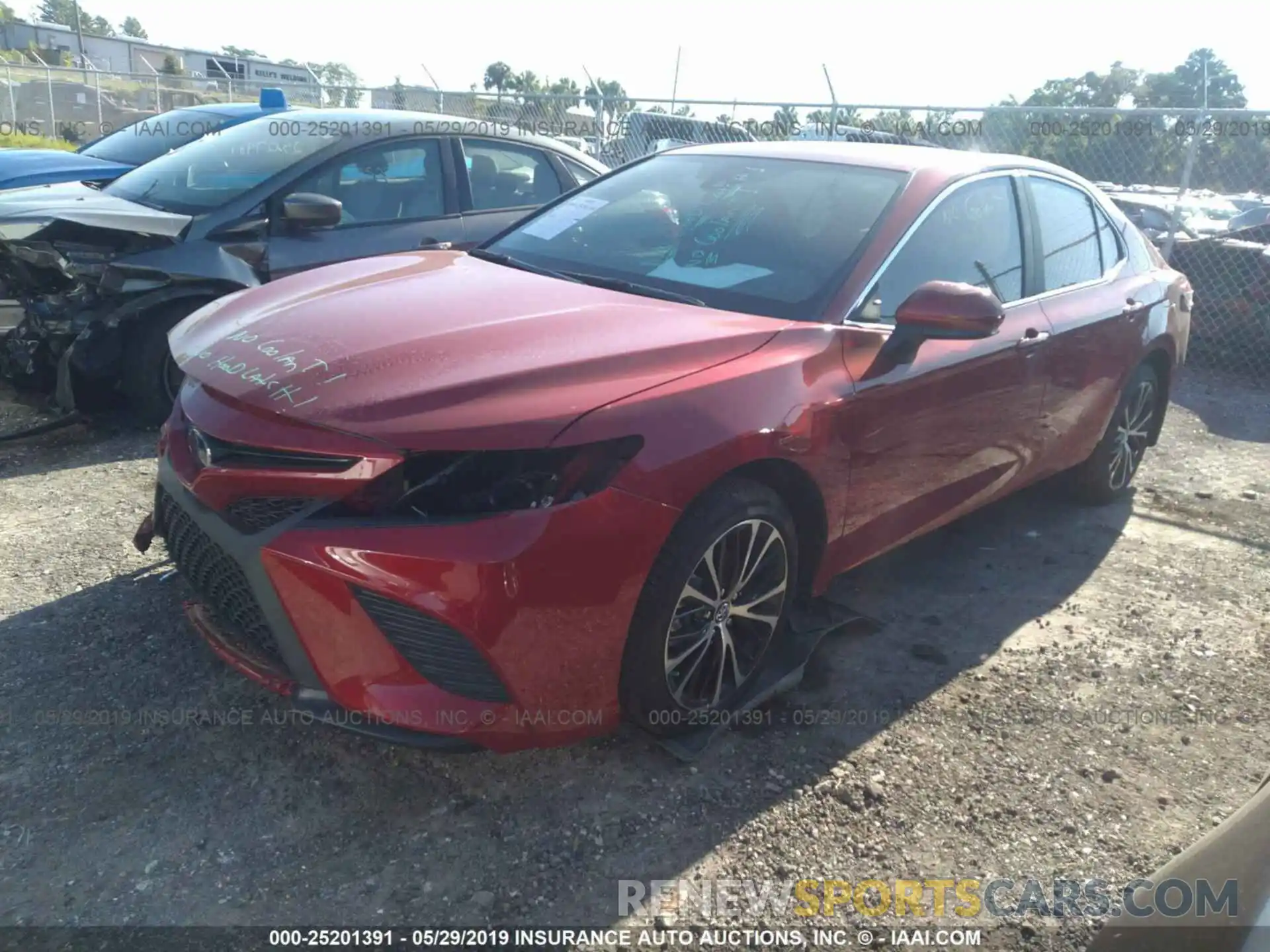 2 Photograph of a damaged car 4T1B11HK9KU216566 TOYOTA CAMRY 2019