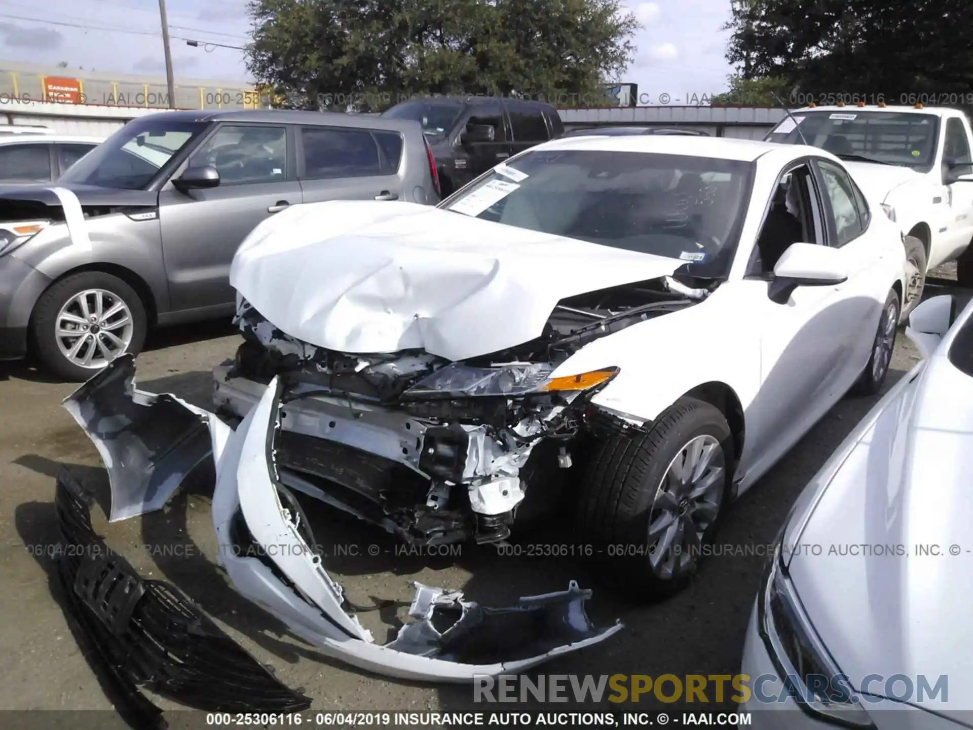 2 Photograph of a damaged car 4T1B11HK9KU216924 TOYOTA CAMRY 2019