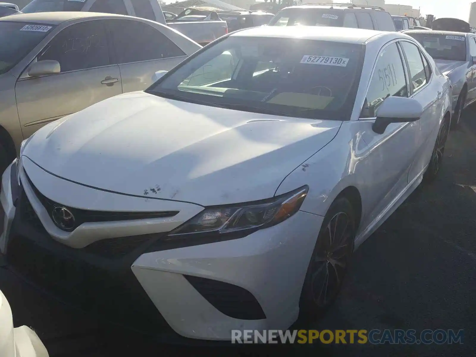 2 Photograph of a damaged car 4T1B11HK9KU222111 TOYOTA CAMRY 2019