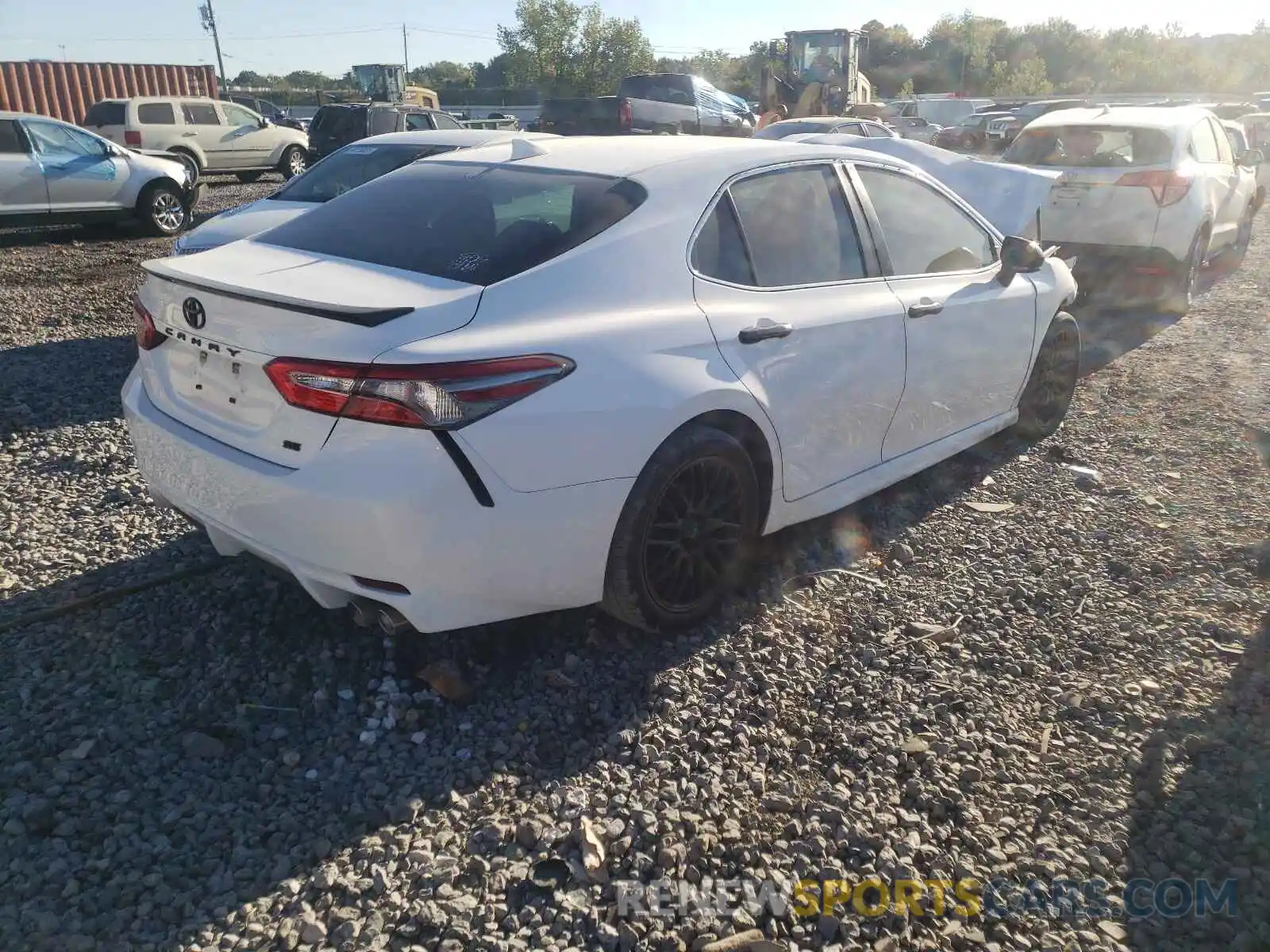 4 Photograph of a damaged car 4T1B11HK9KU223095 TOYOTA CAMRY 2019