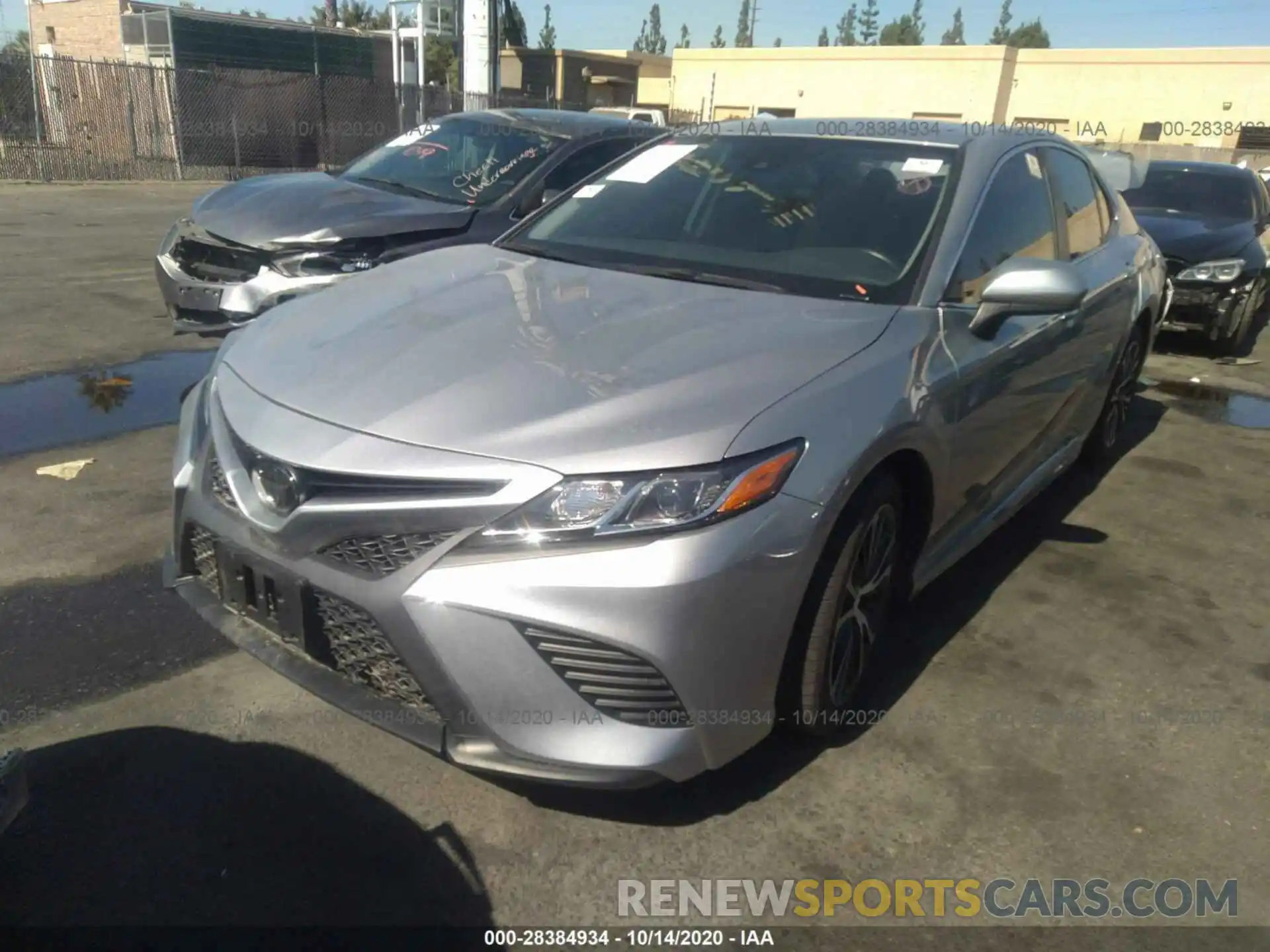 2 Photograph of a damaged car 4T1B11HK9KU223923 TOYOTA CAMRY 2019