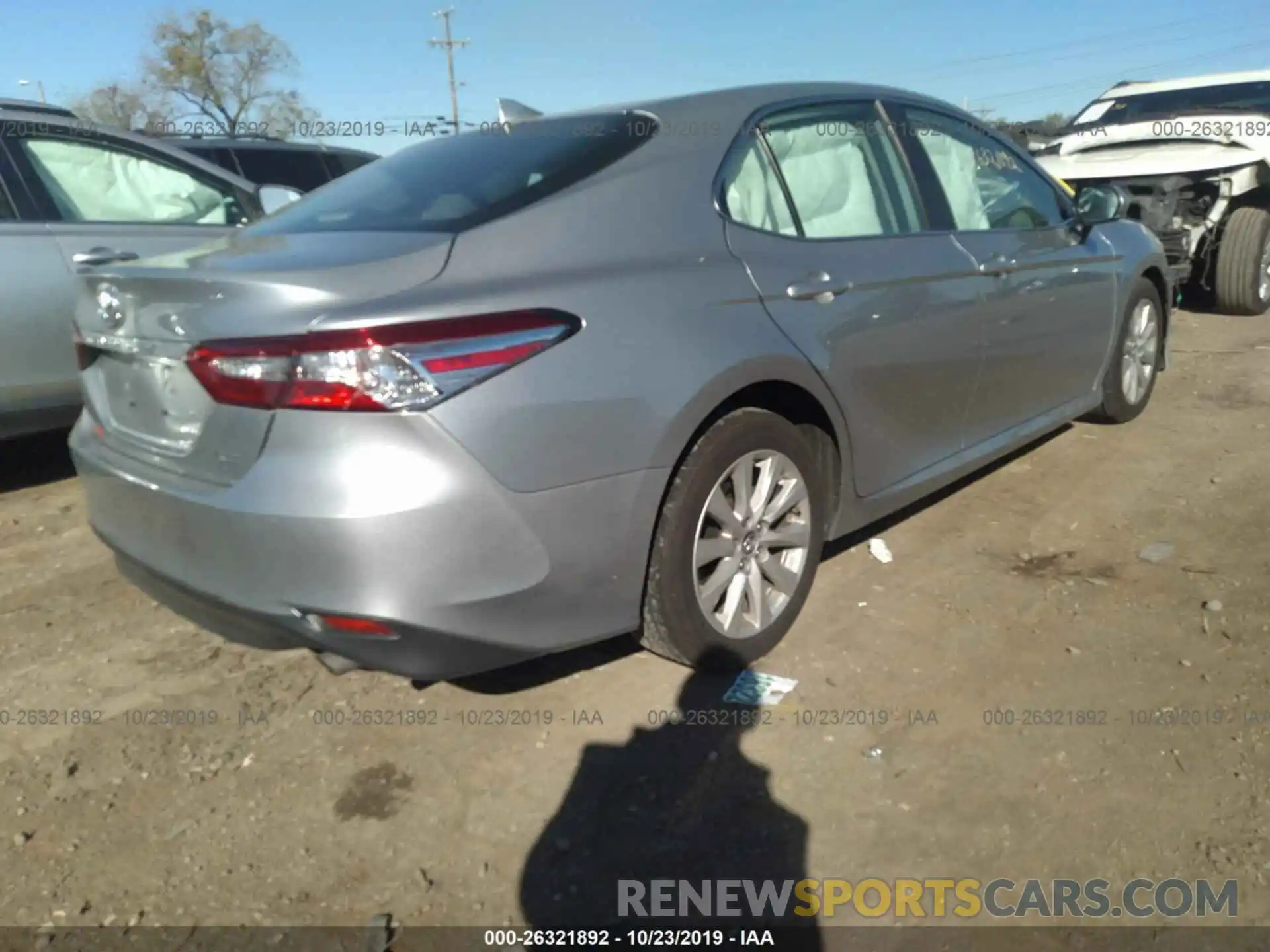 4 Photograph of a damaged car 4T1B11HK9KU227101 TOYOTA CAMRY 2019